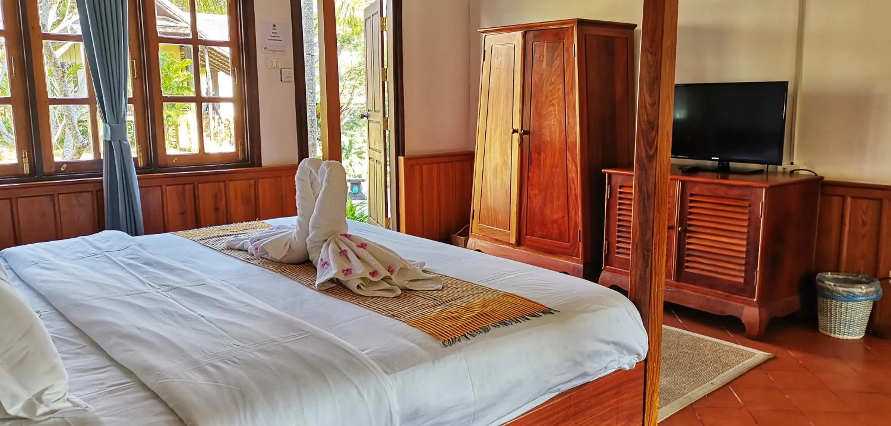 Bed in Luang Prabang Paradise Resort