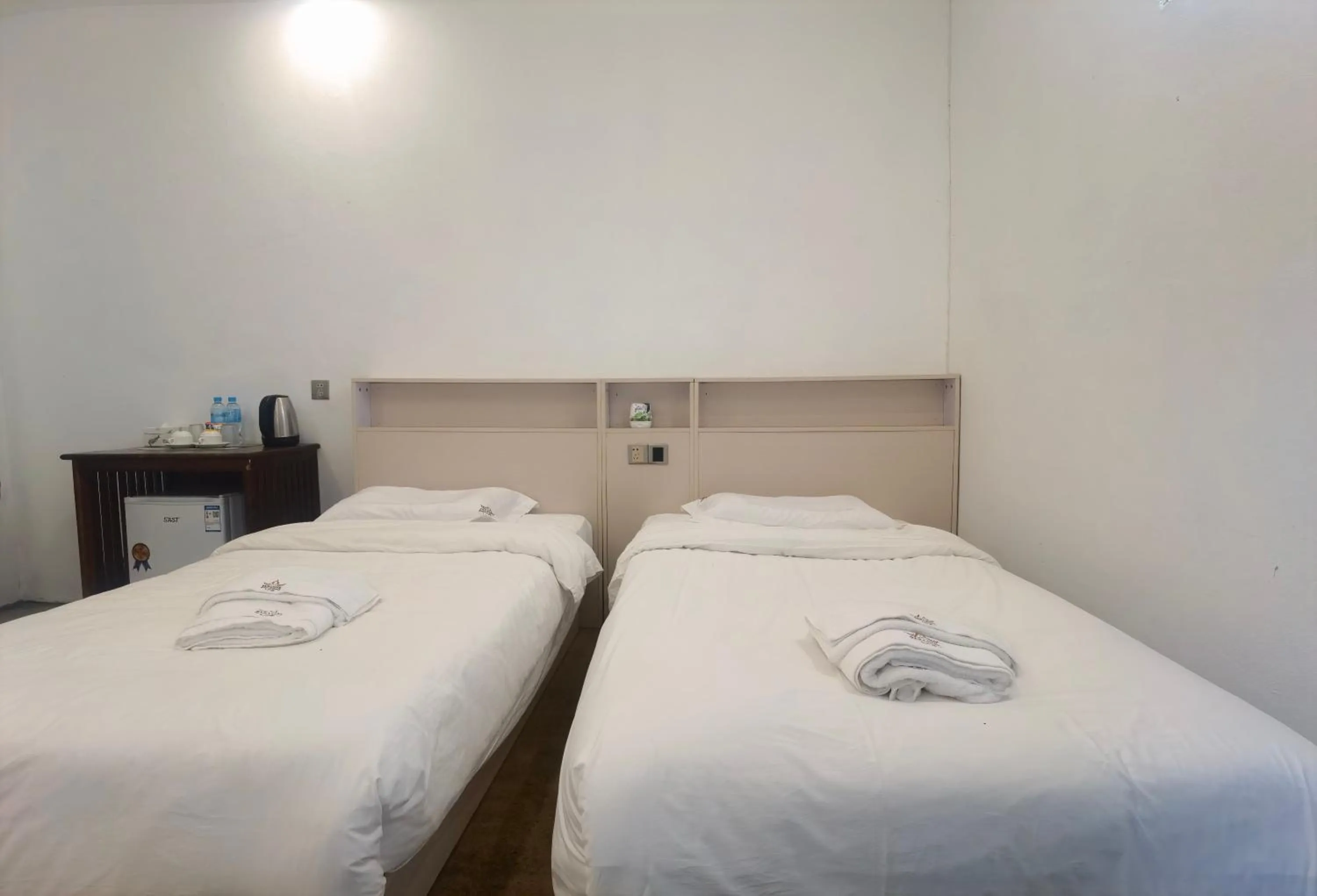 Bed in Luang Prabang Paradise Resort