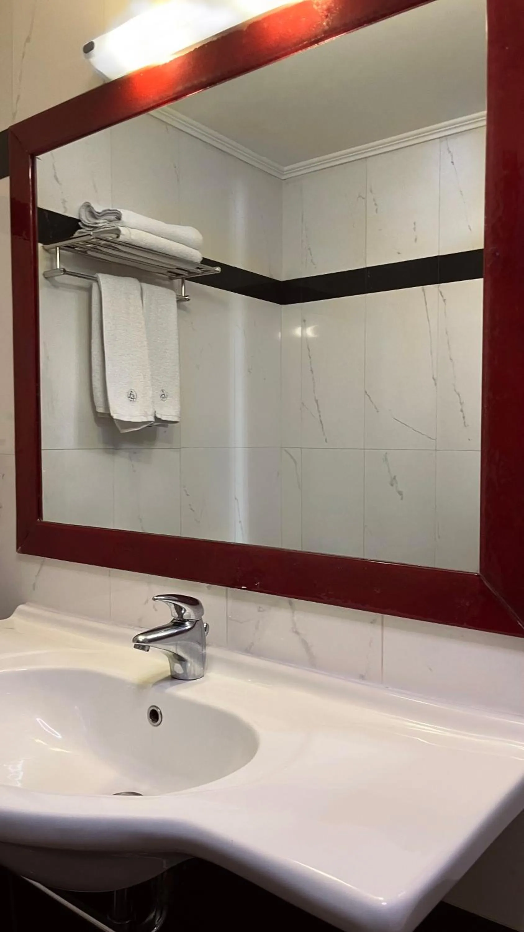 Bathroom in Alfa Hotel