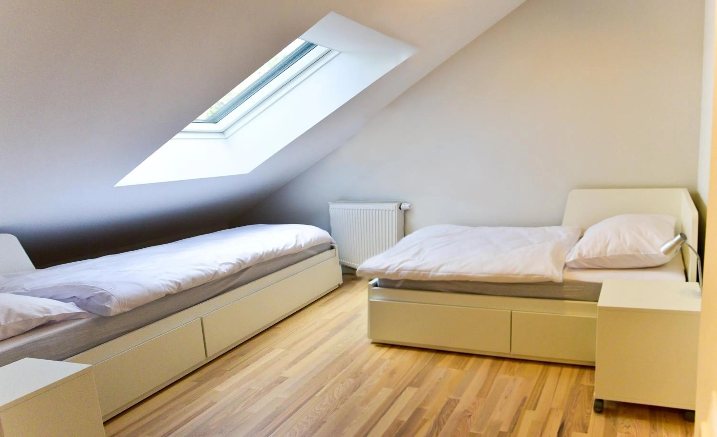 Bed in Apartament Dwupoziomowy z Sauną - Apartamentuj