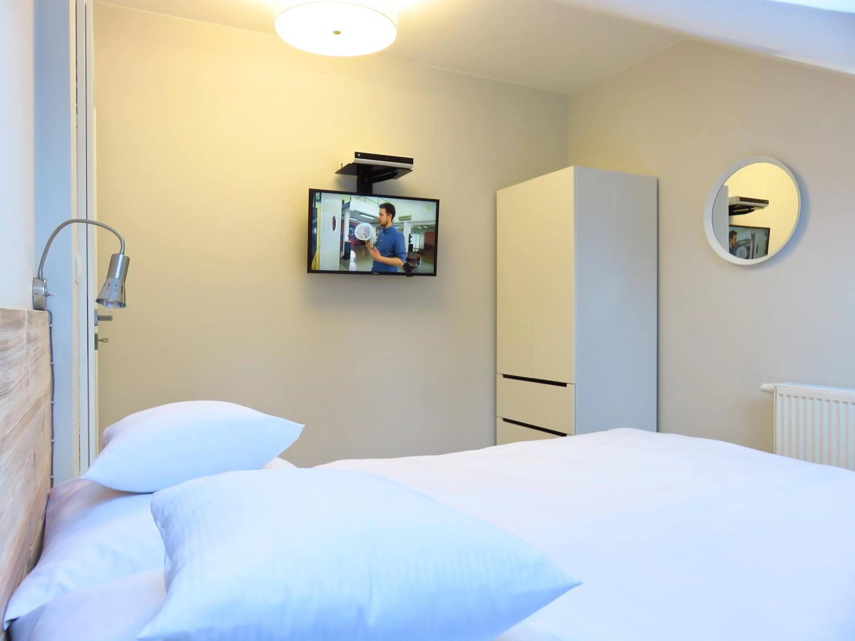 Bed in Apartament Dwupoziomowy z Sauną - Apartamentuj