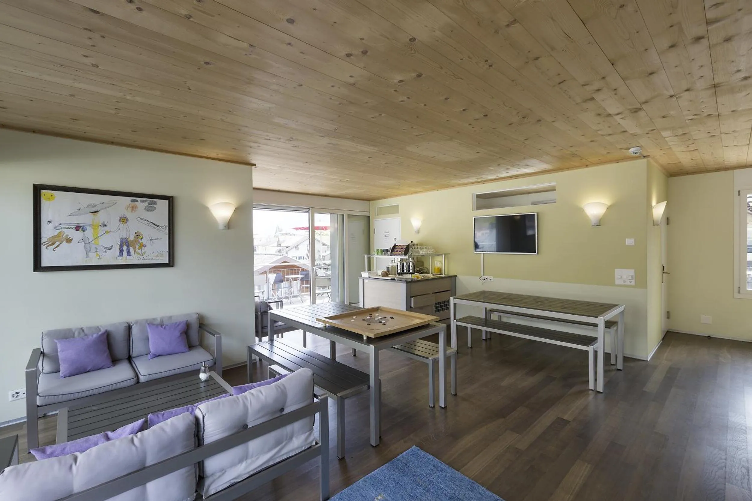 Communal lounge/ TV room in Alplodge