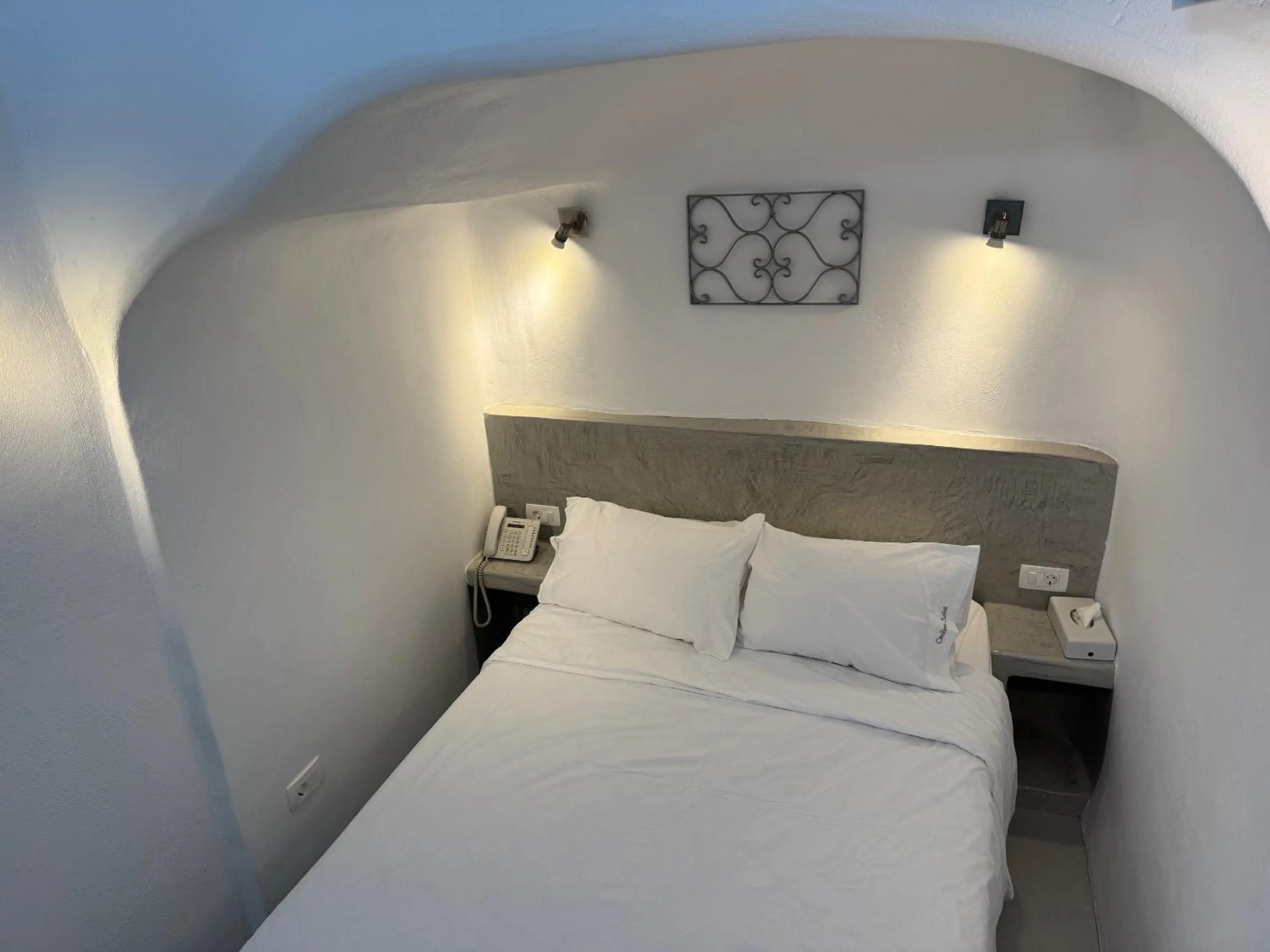 Bed in Theodora Suites