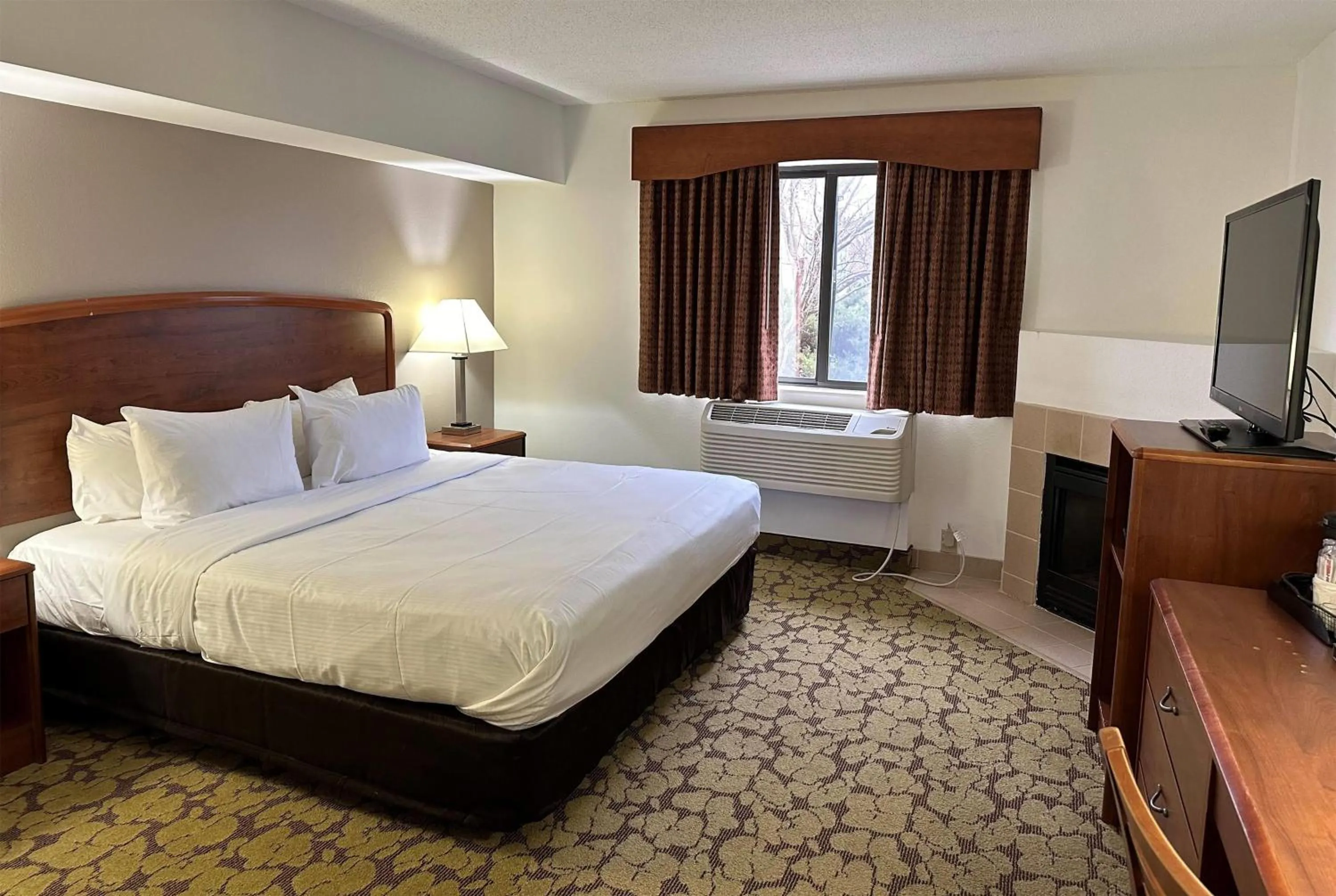 Photo of the whole room in AmericInn by Wyndham Appleton North Little Chute