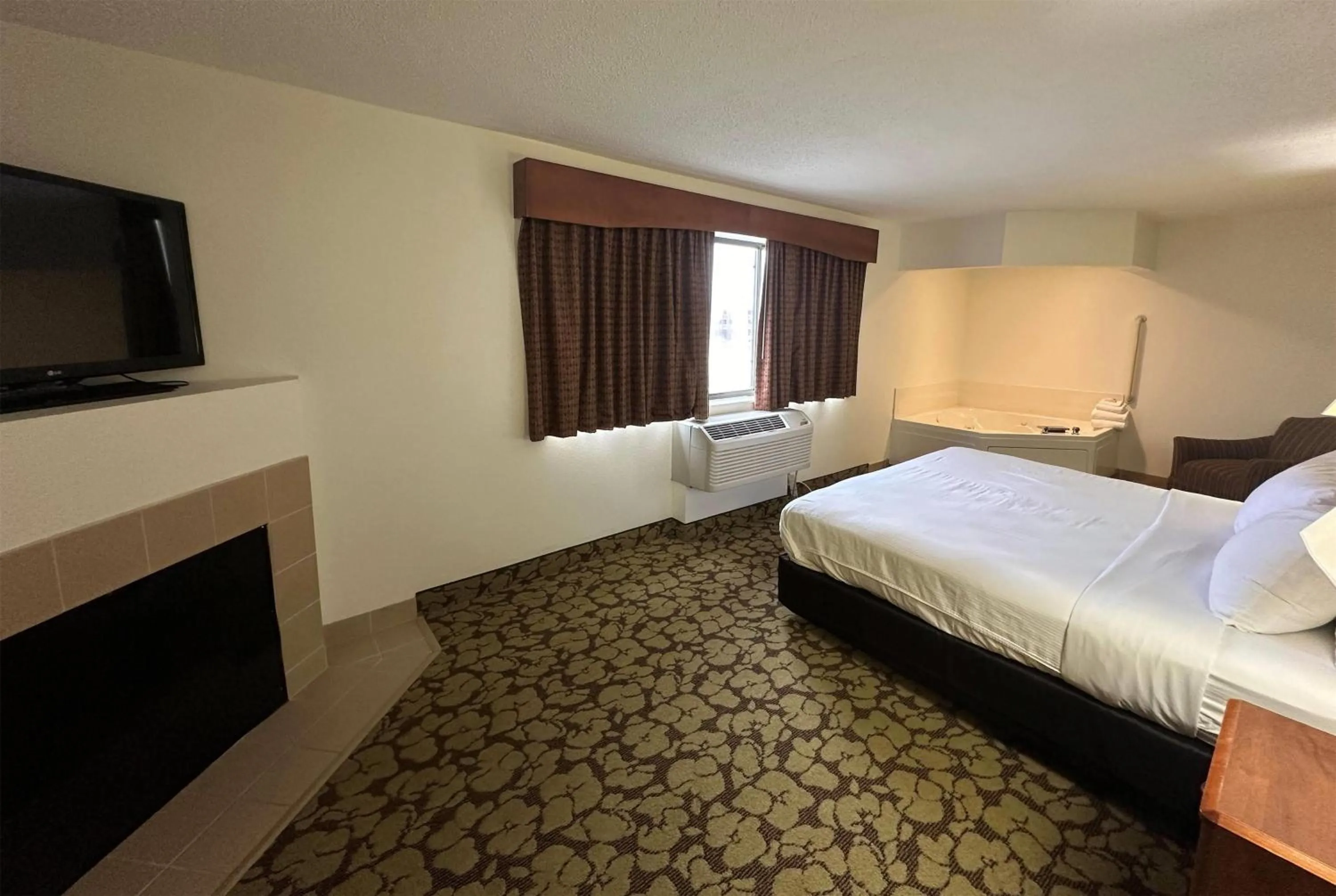 Photo of the whole room in AmericInn by Wyndham Appleton North Little Chute