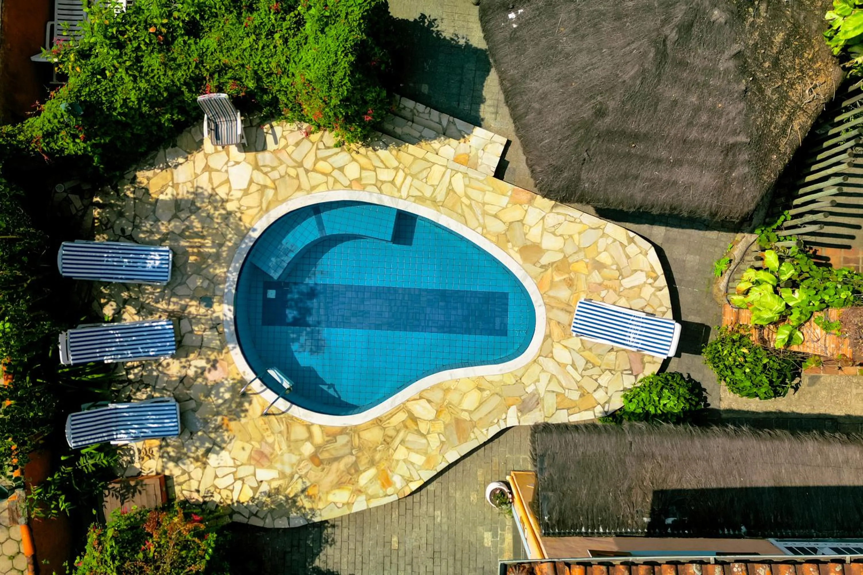 Swimming pool in VELINN Pousada Ponta do Pequeah