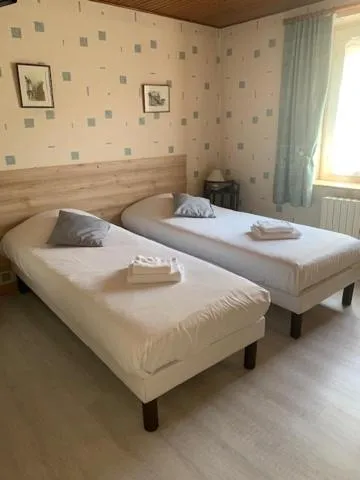 Bed in Logis Auberge De La Plaine