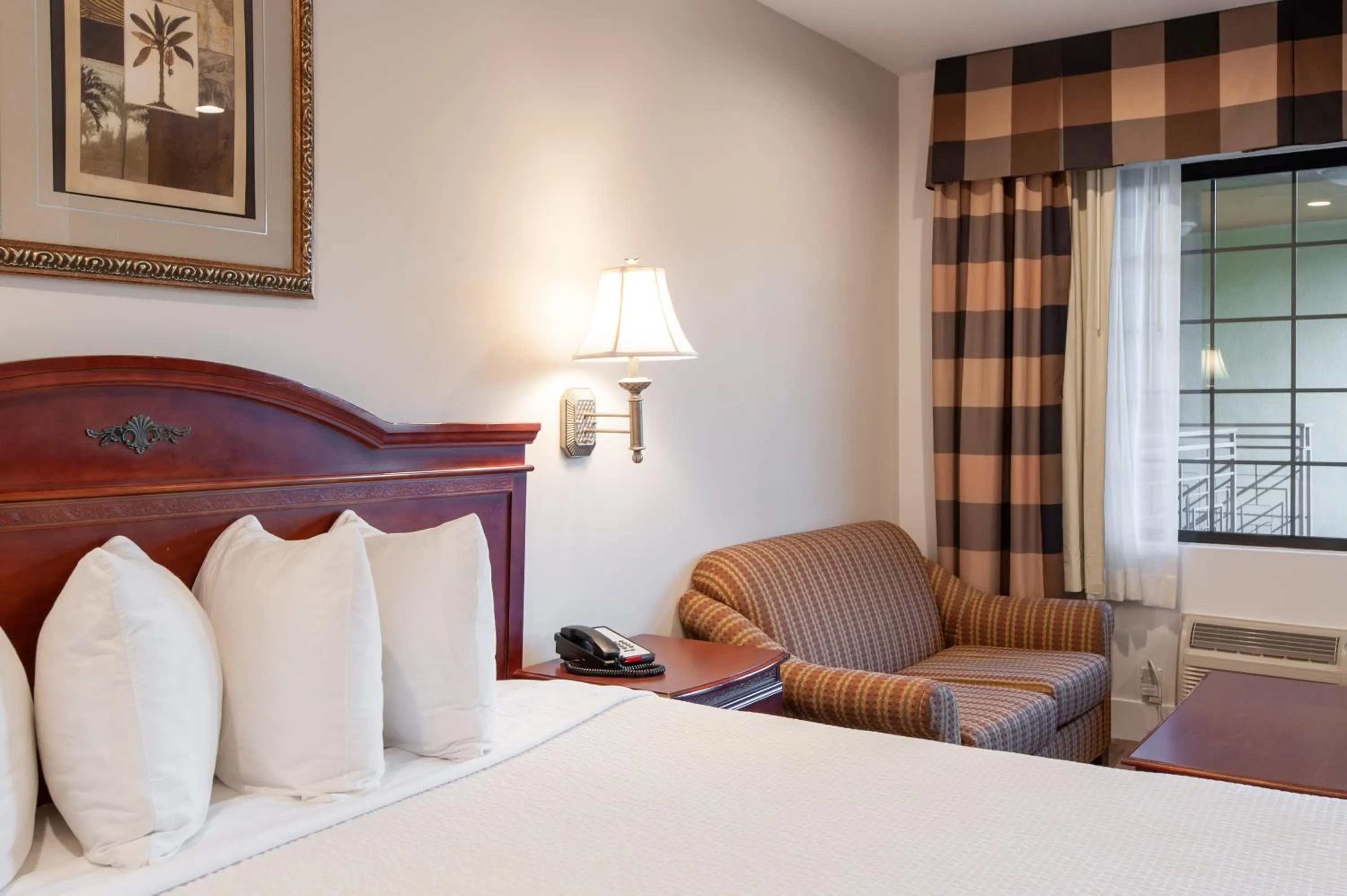 Bed in Studio City Court Yard Hotel