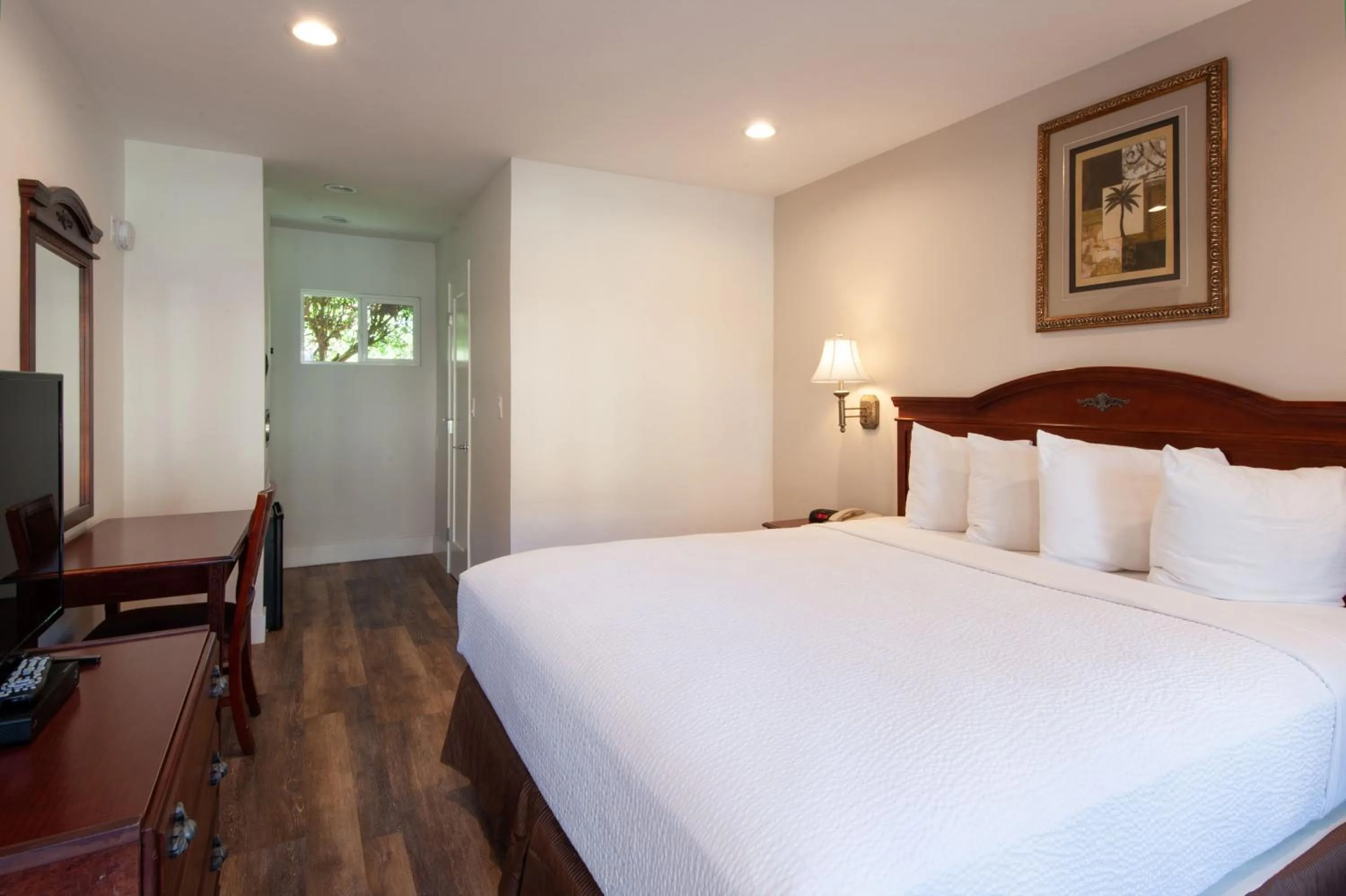 Bed in Studio City Court Yard Hotel