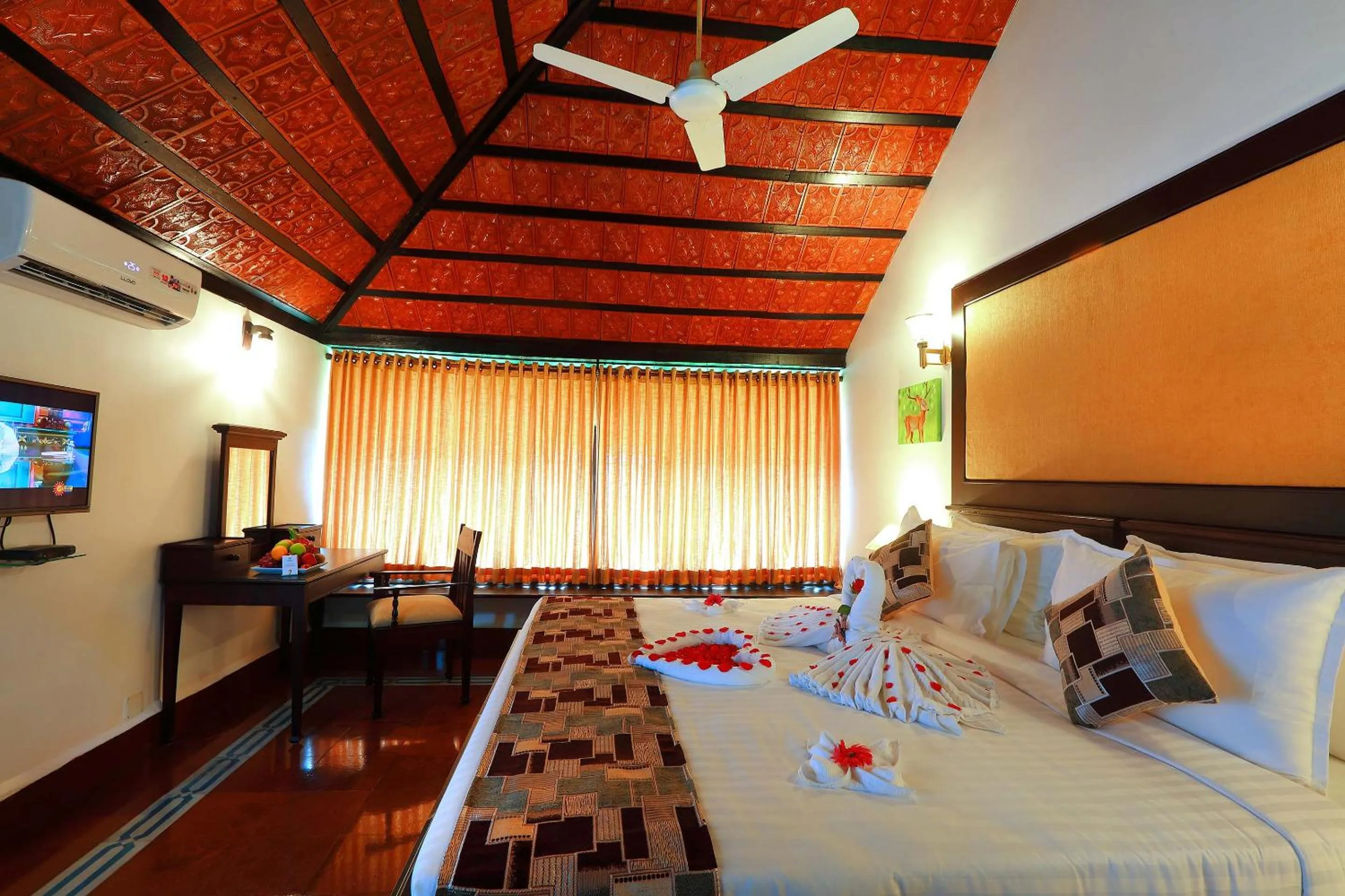 Bed in Nihara Resort and Spa Cochin
