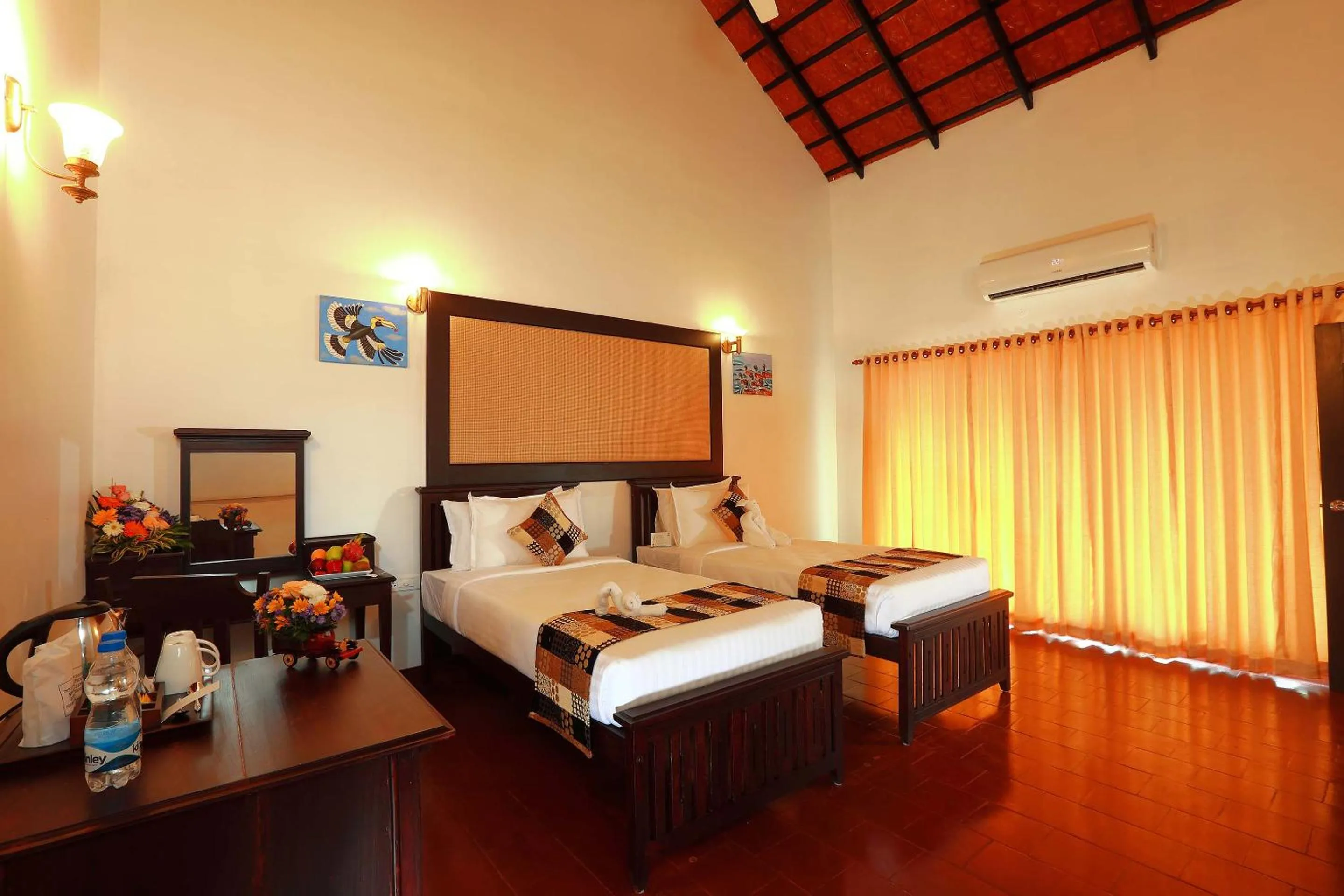 Photo of the whole room, Bed in Nihara Resort and Spa Cochin