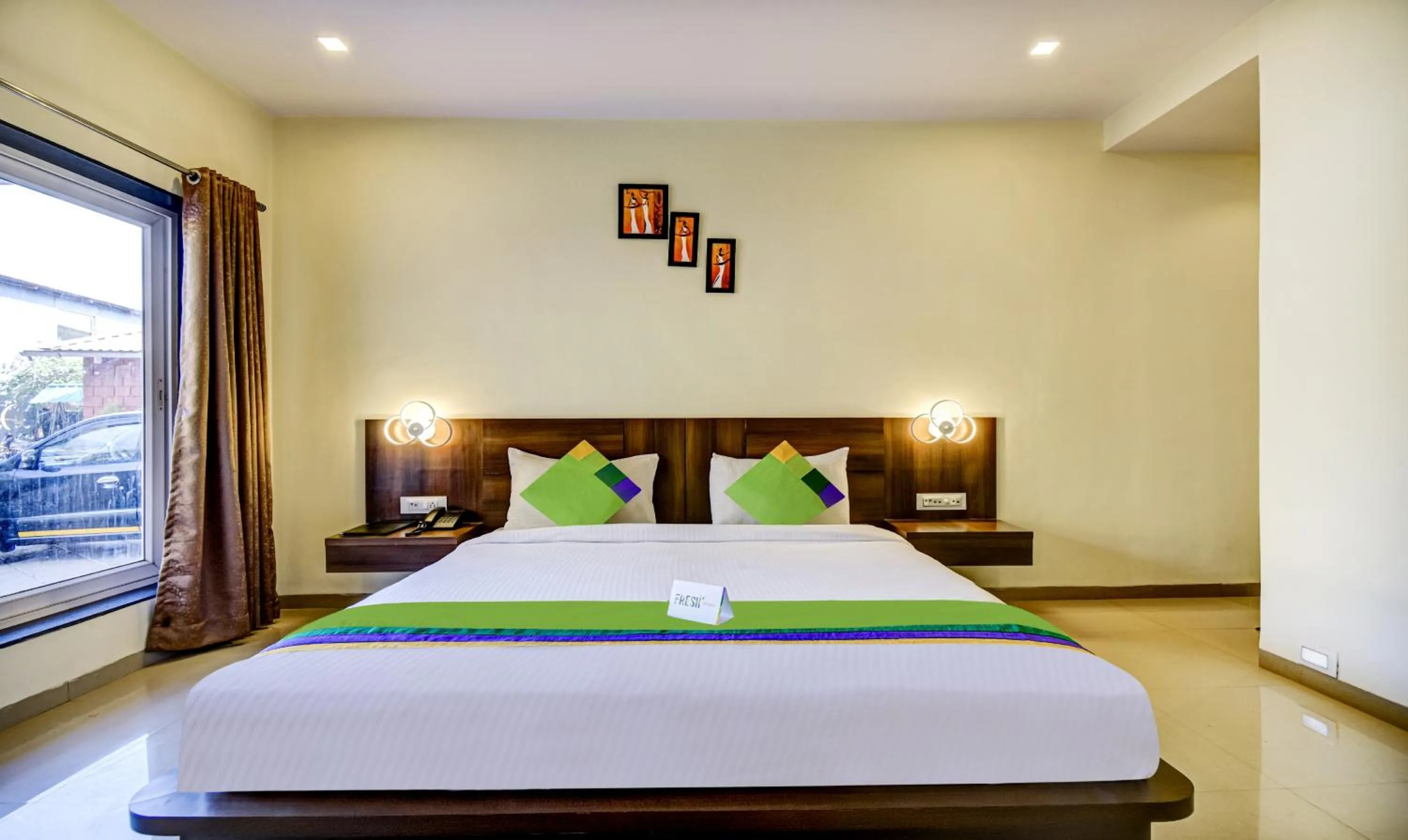 Bed in Treebo JP Cottage