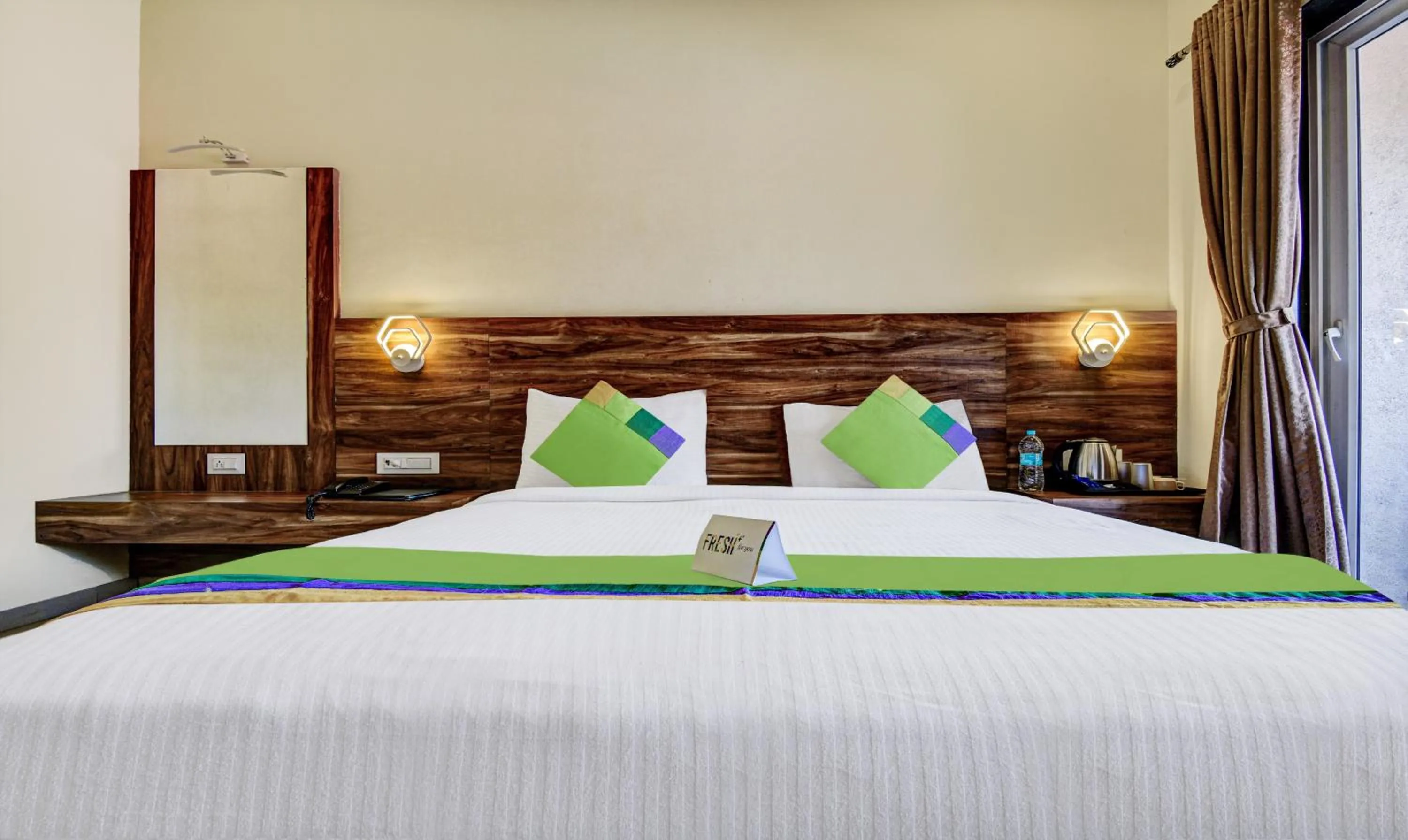 Bed in Treebo JP Cottage