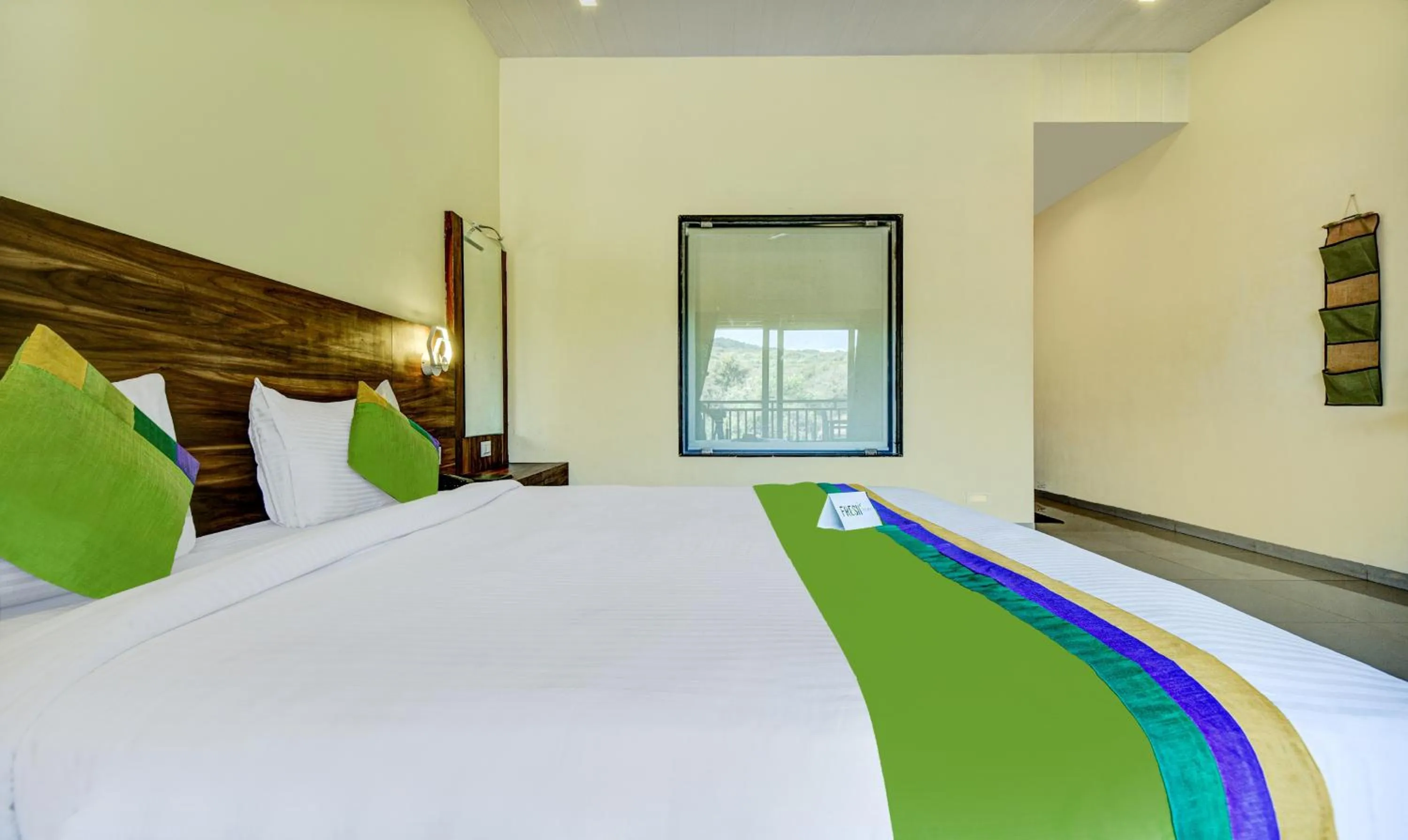 Bed in Treebo JP Cottage