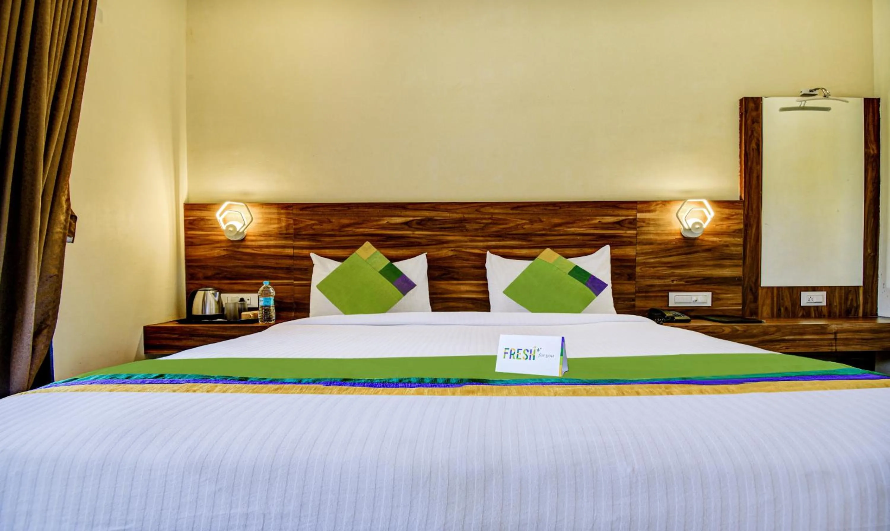 Bed in Treebo JP Cottage