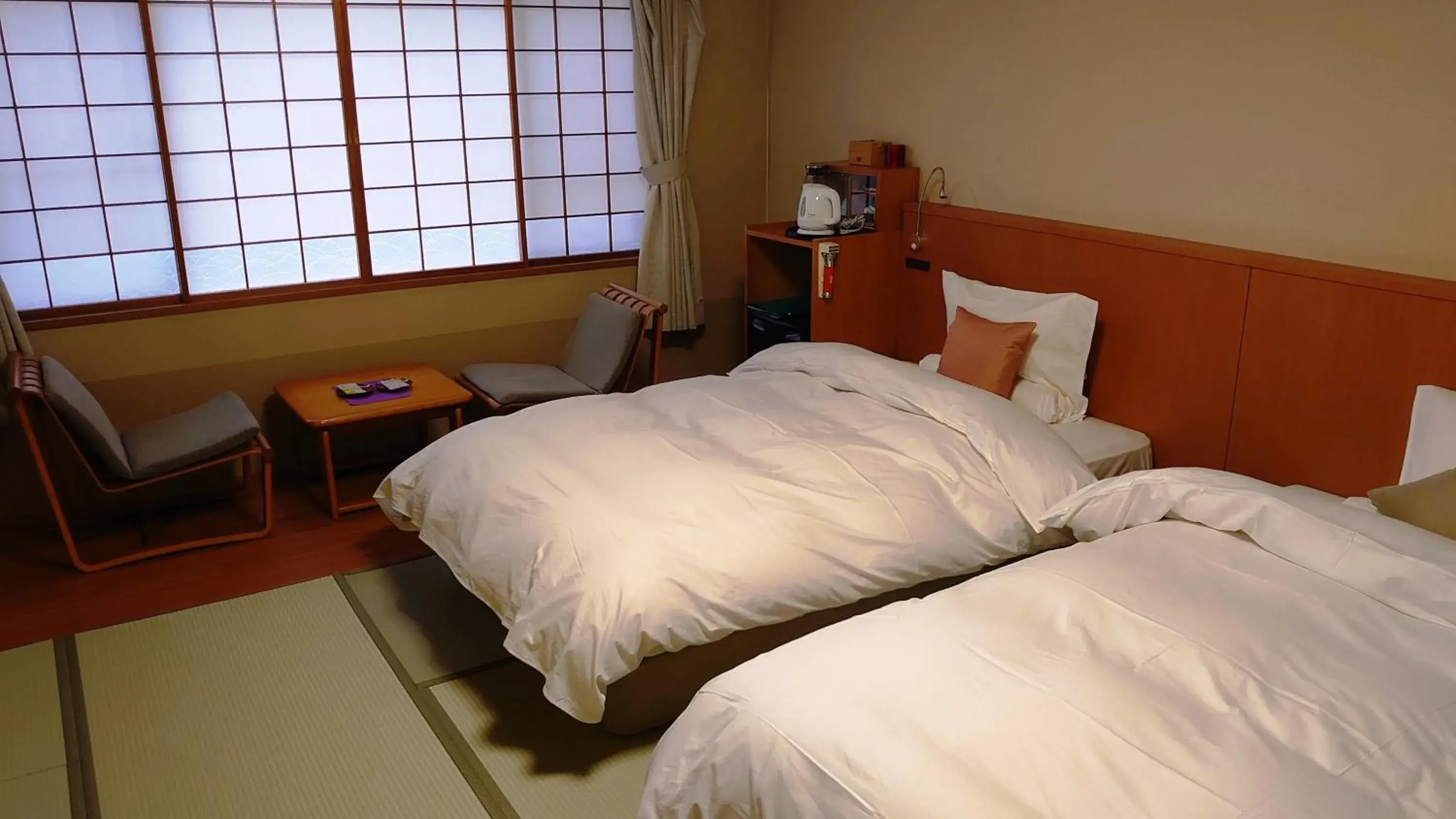 Photo of the whole room, Bed in Takinoya Bekkan Tamanoyu Photo of the whole room, Bed in Takinoya Bekkan Tamanoyu