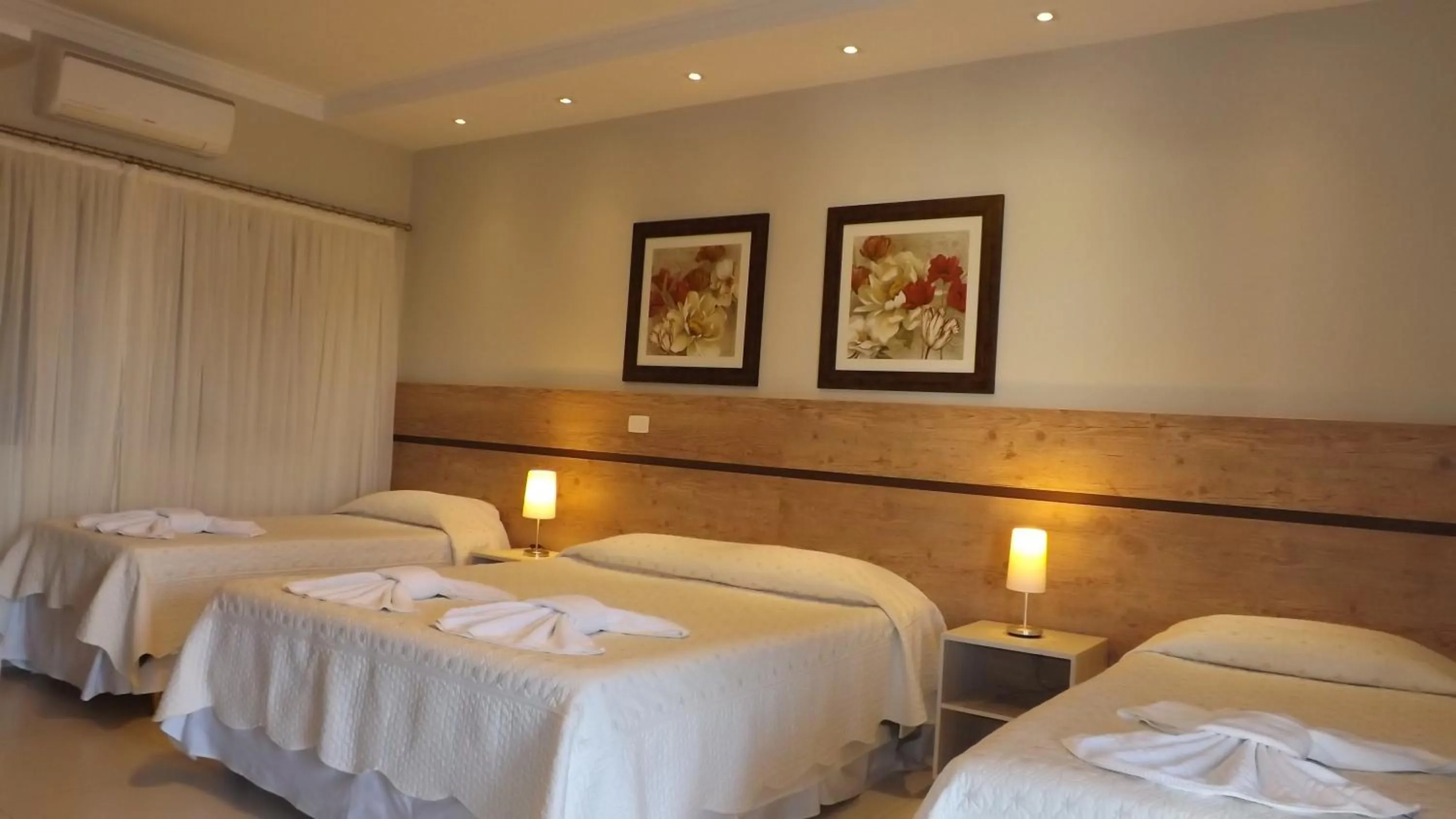 Photo of the whole room, Bed in Pousada Surucuá - Bonito MS