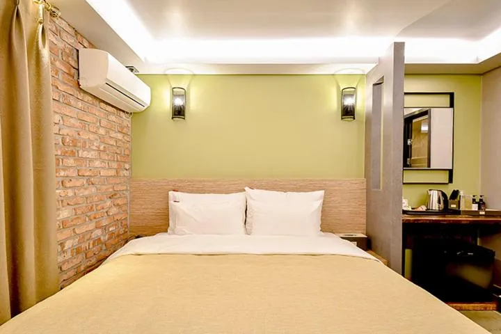 Bed in Ulsan Hotel 109