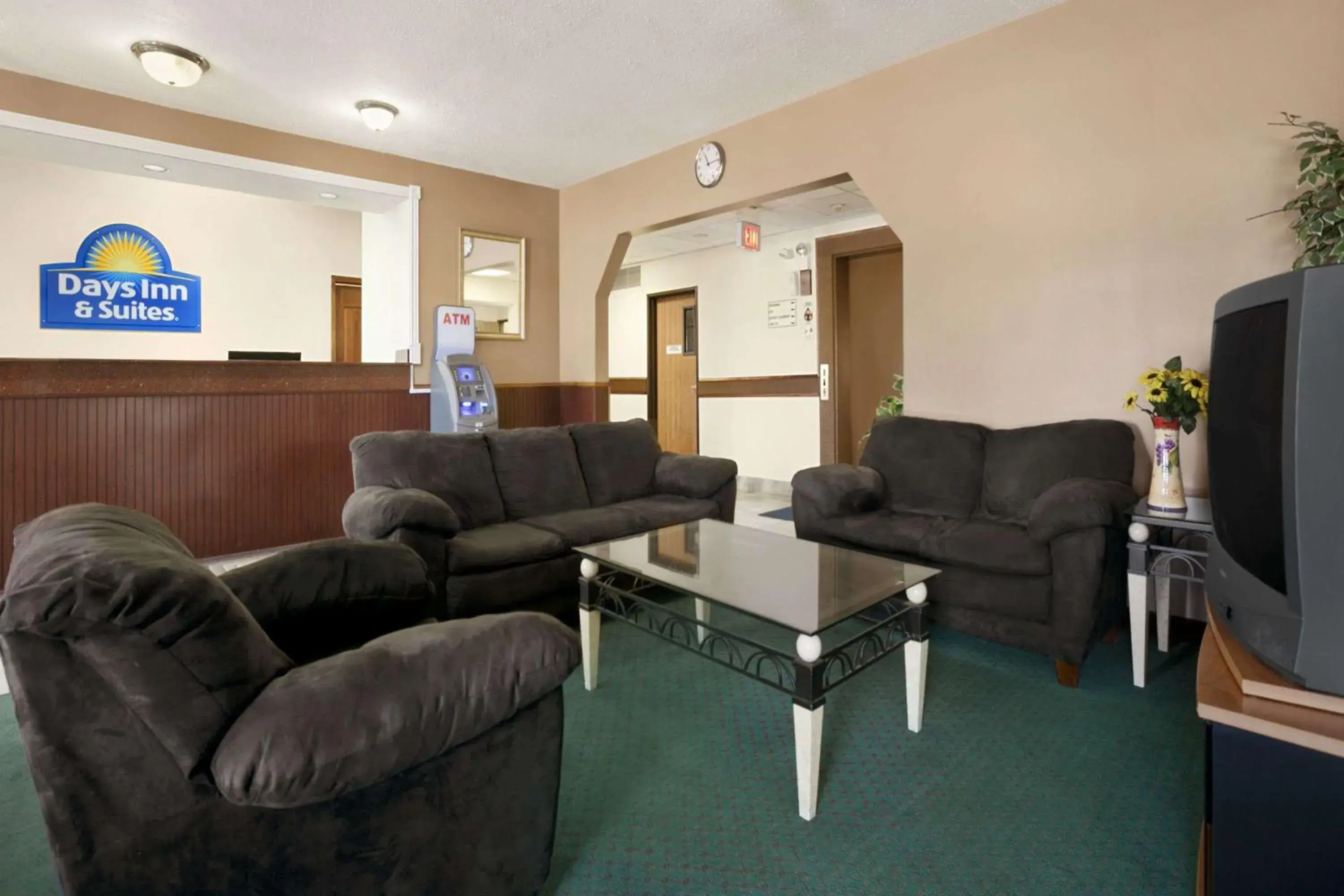 Lobby or reception in Days Inn & Suites by Wyndham Romeoville Lobby or reception in Days Inn & Suites by Wyndham Romeoville