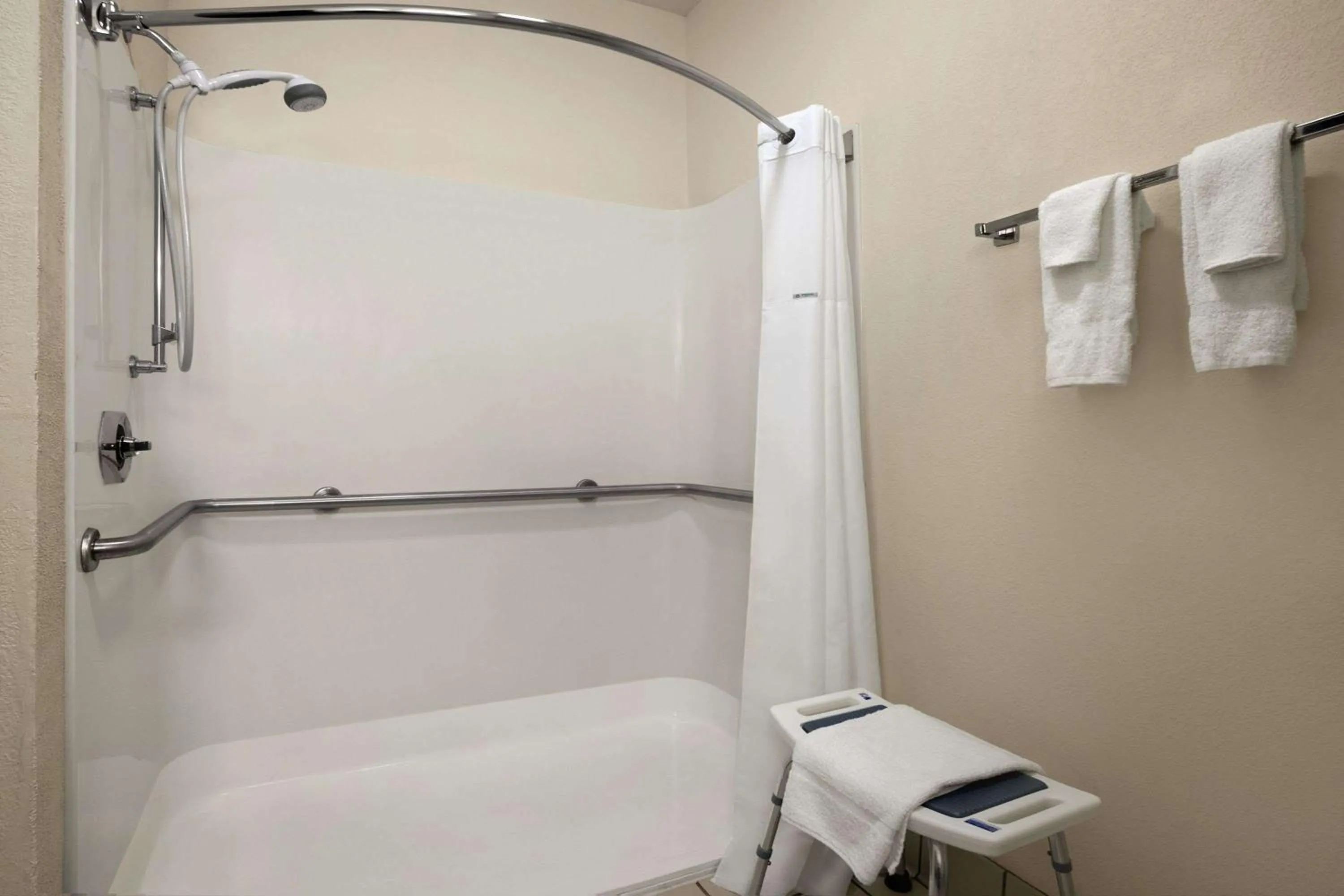 Bathroom in Days Inn & Suites by Wyndham Romeoville