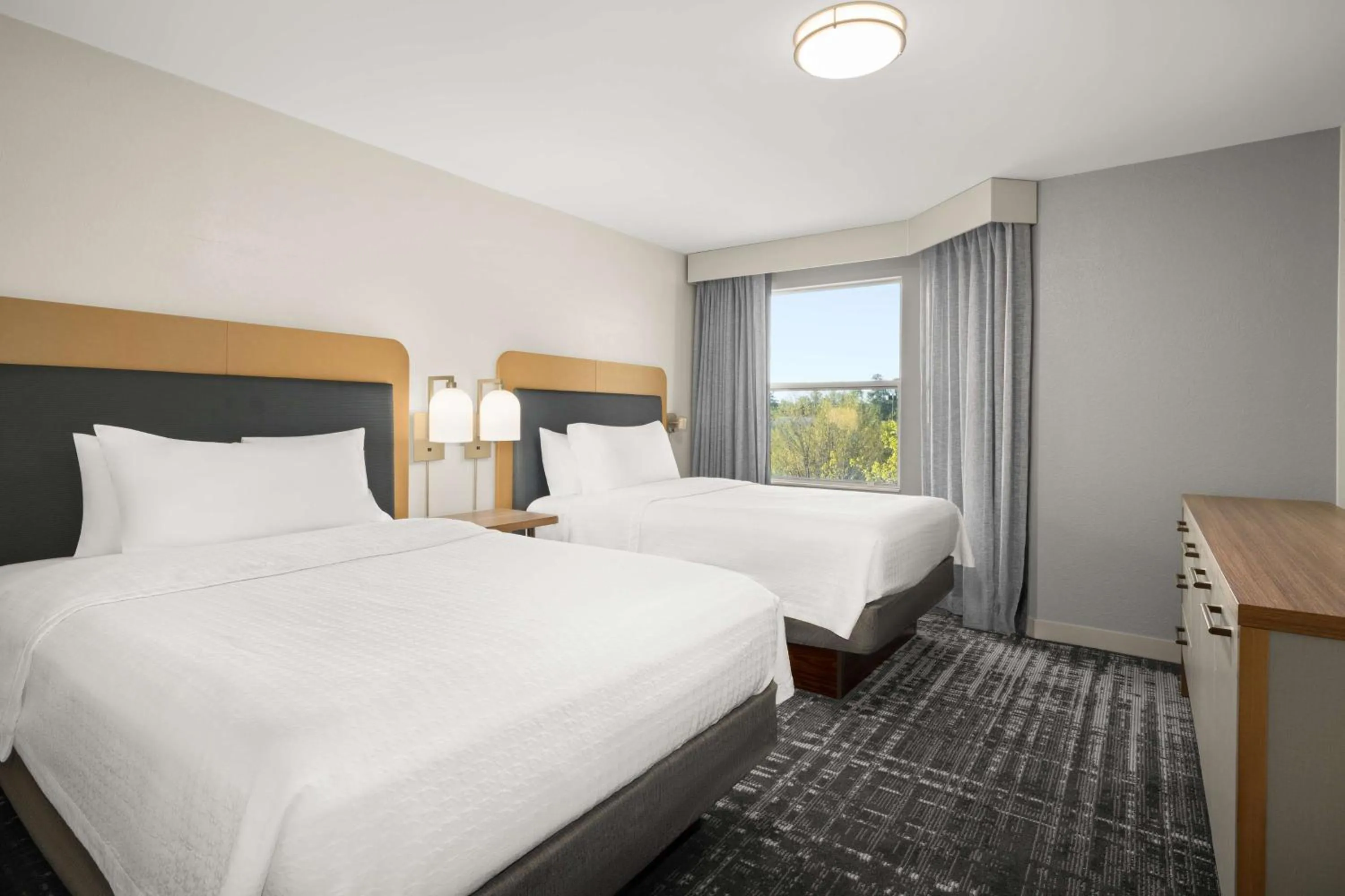Bed in Homewood Suites by Hilton Atlanta-Alpharetta