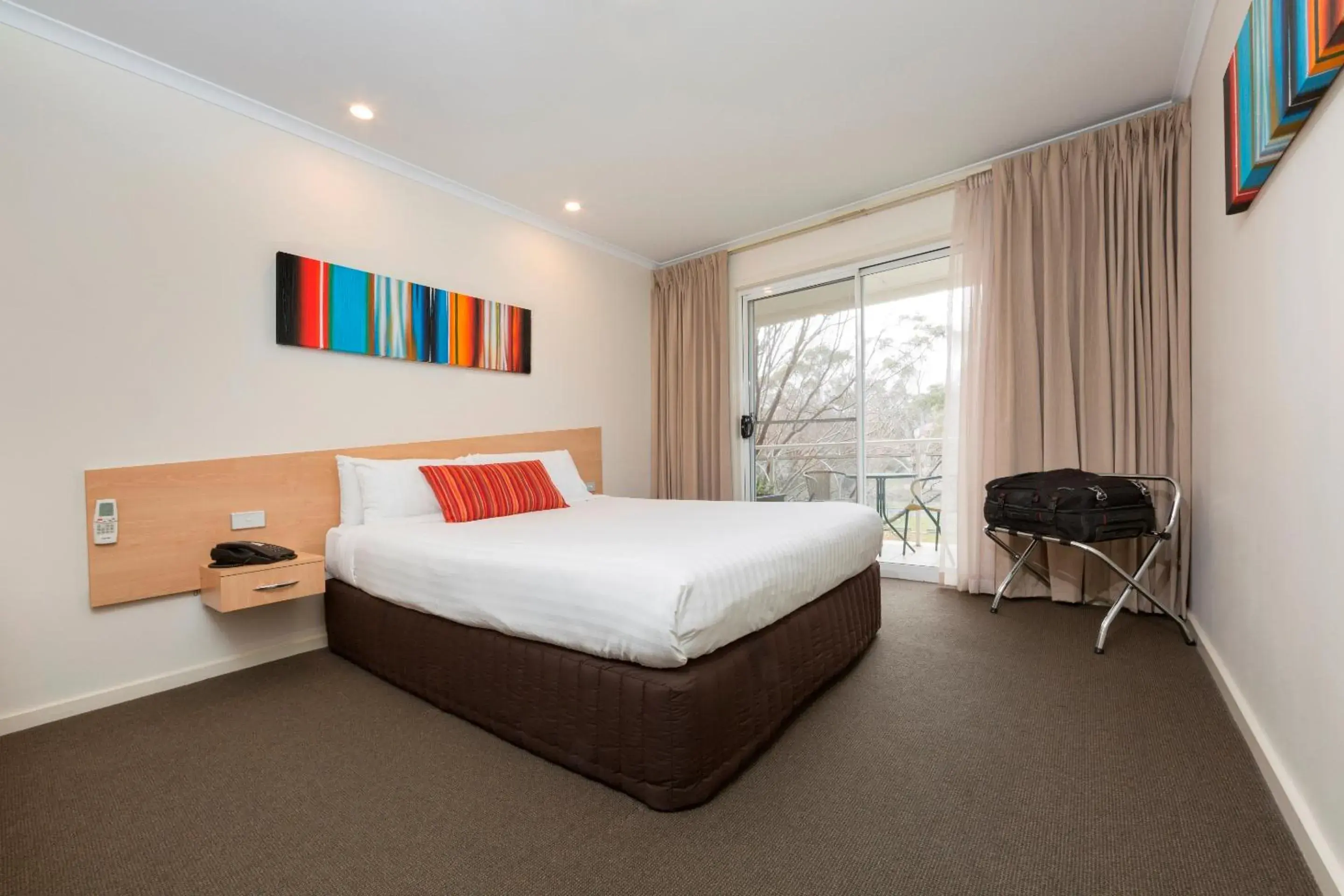 Bedroom in Ramada Encore by Wyndham Belconnen Canberra Bedroom in Ramada Encore by Wyndham Belconnen Canberra