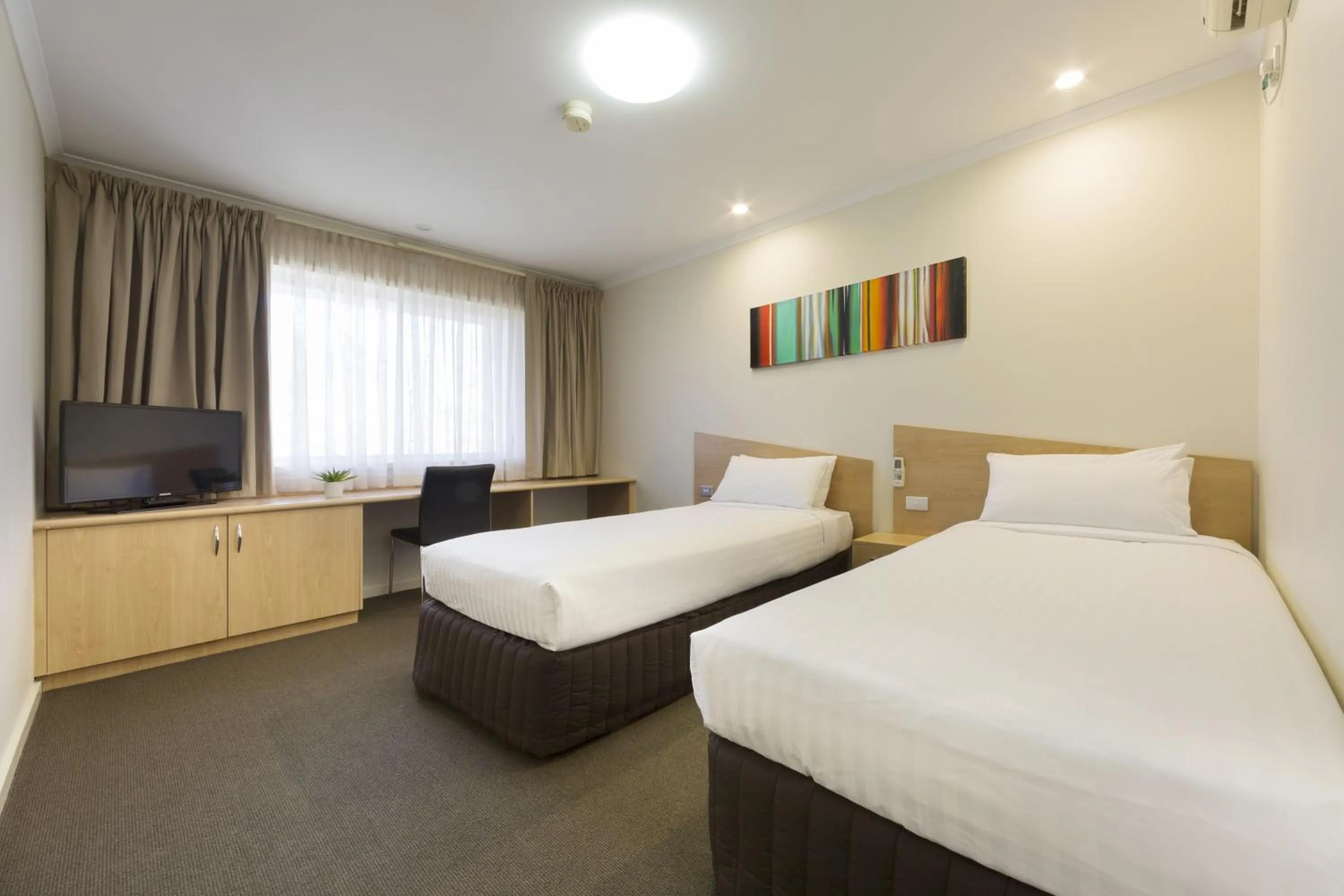Bedroom in Ramada Encore by Wyndham Belconnen Canberra