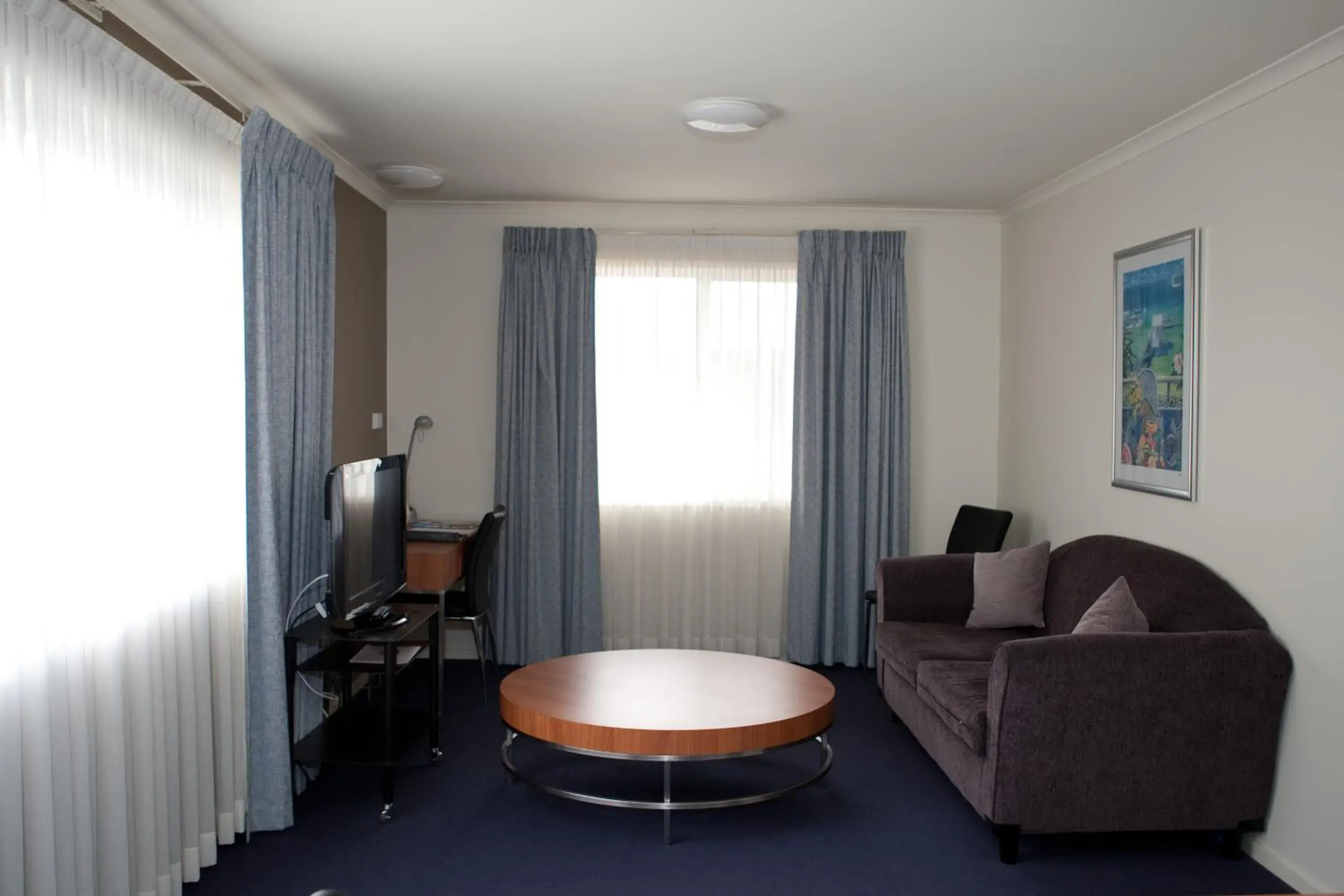 Living room in Ramada Encore by Wyndham Belconnen Canberra Living room in Ramada Encore by Wyndham Belconnen Canberra