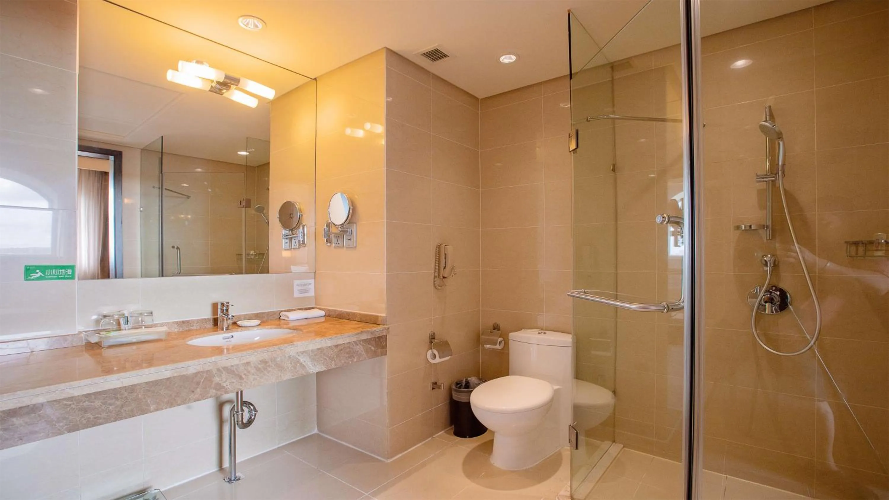 Bathroom in Holiday Inn Mudanjiang by IHG