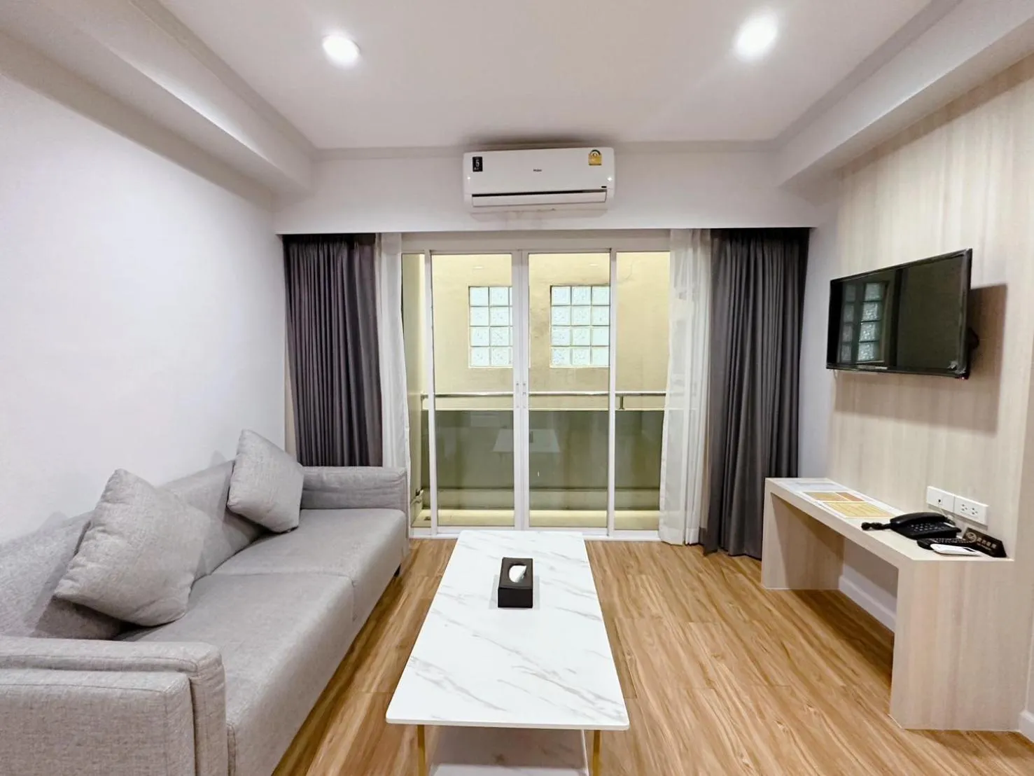 Living room in Miloft Sathorn Hotel - SHA Plus Certified