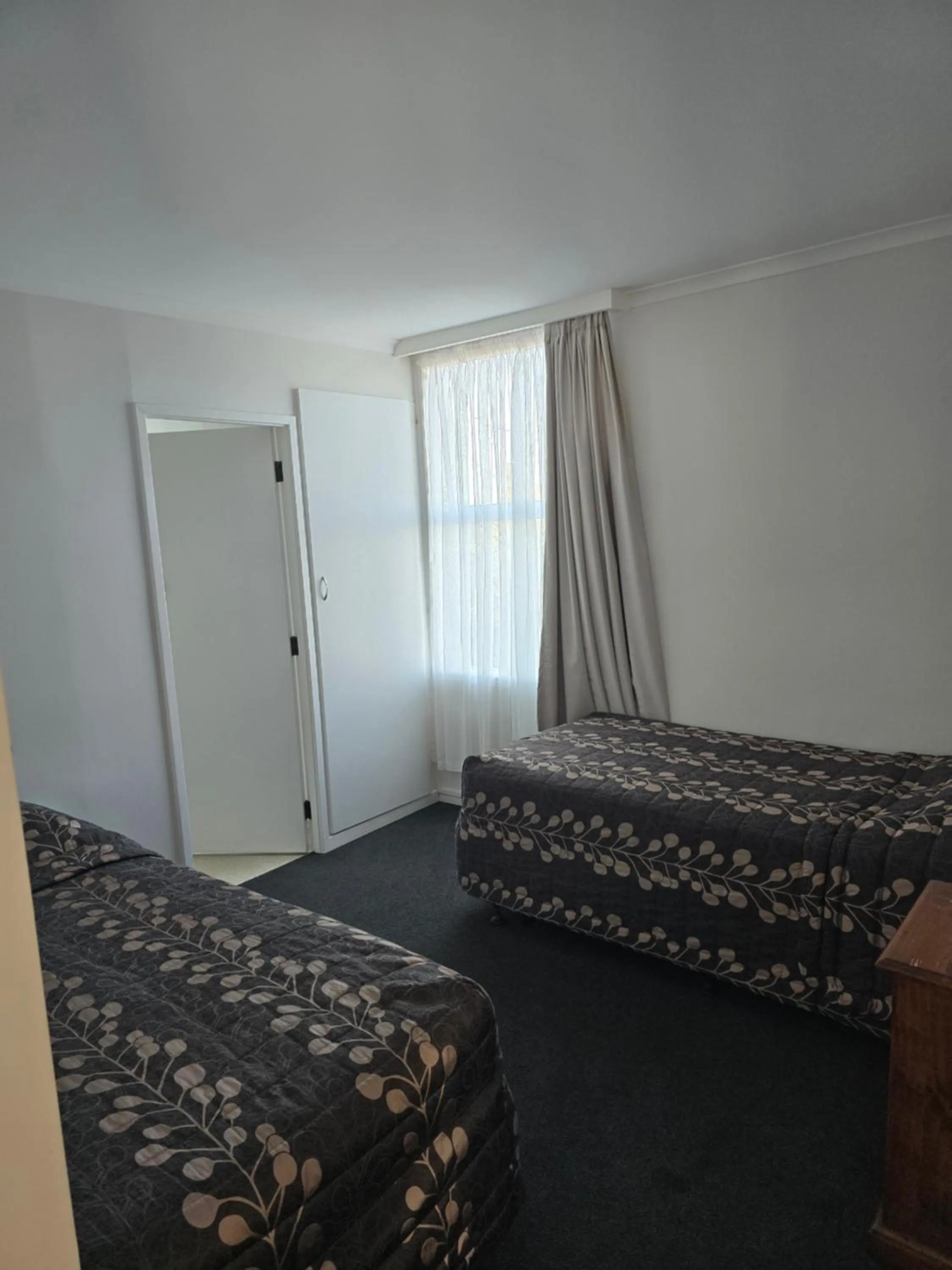 Bed in Monarch Motel