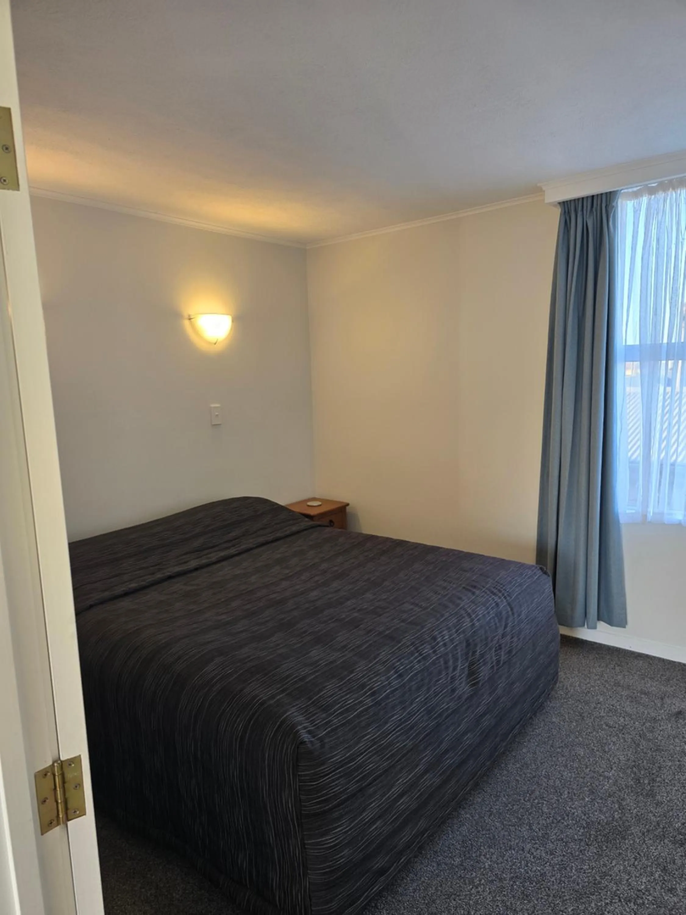 Bed in Monarch Motel