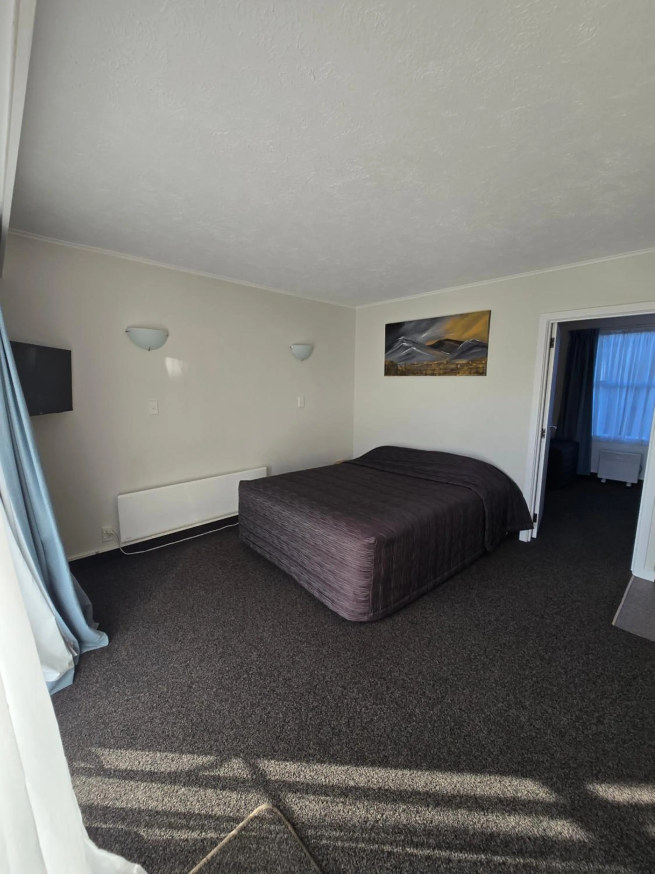 Bed in Monarch Motel