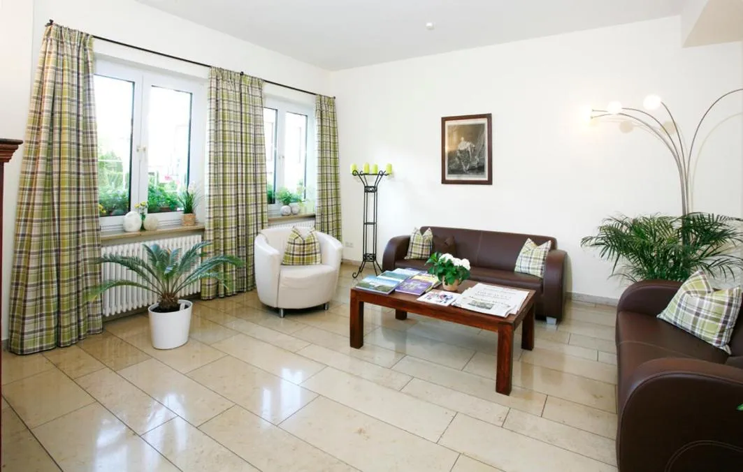 Lobby or reception in Hotel Biederstein am Englischen Garten