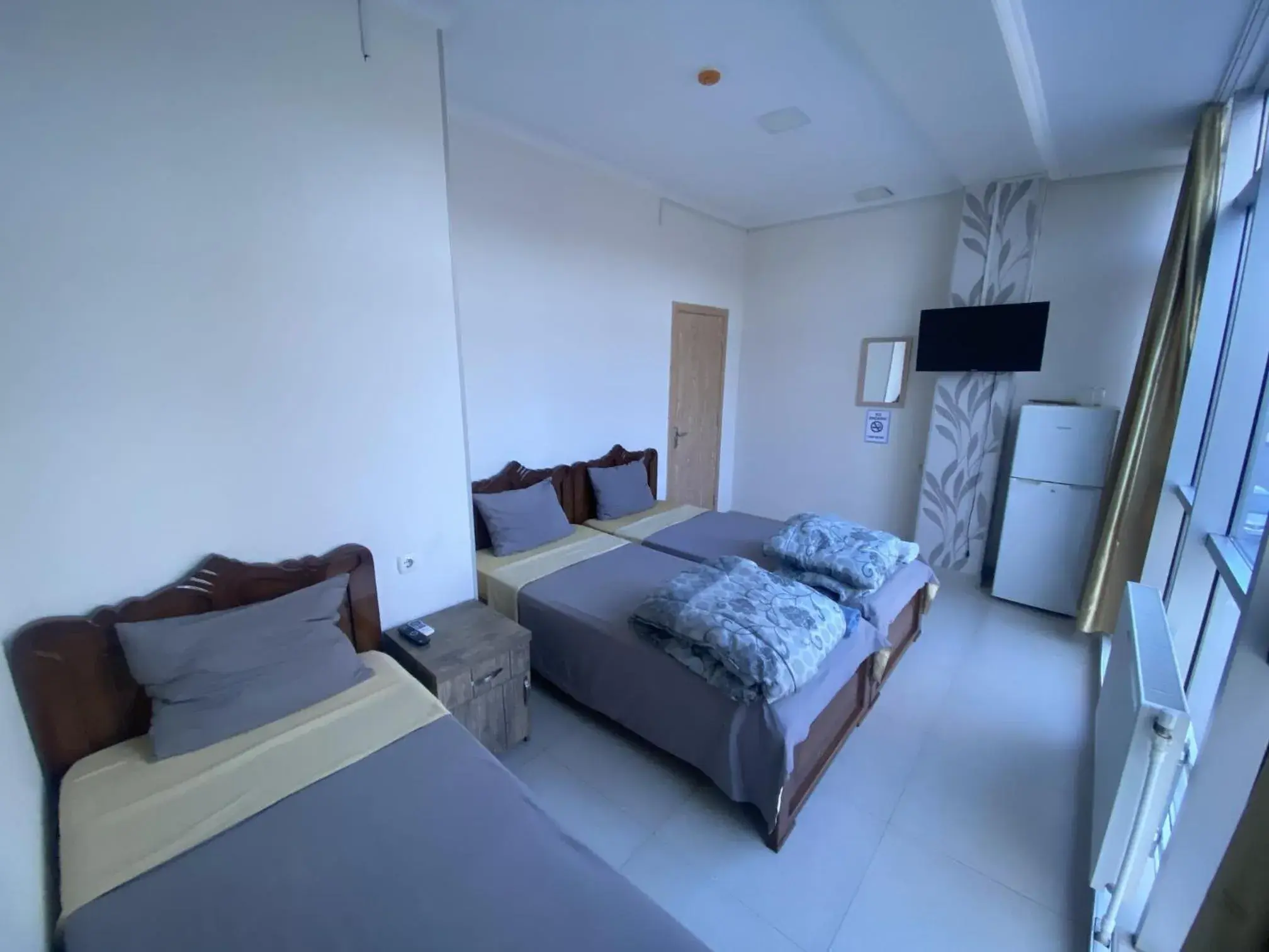 Triple Room with Shared Bathroom in Hotel G & J Triple Room with Shared Bathroom in Hotel G & J