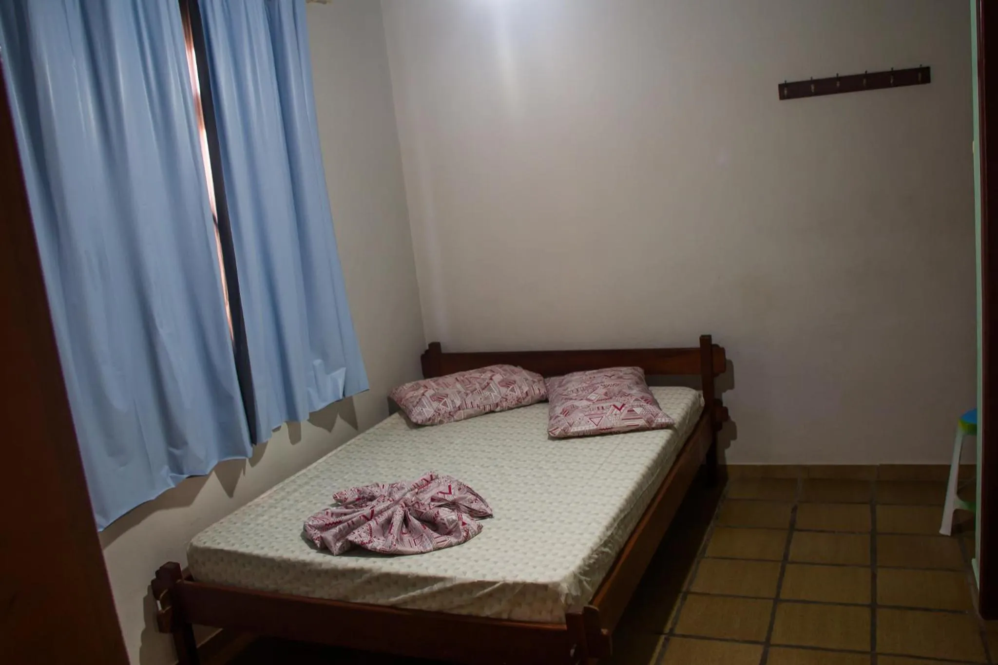 Bed in Pousada Oliveira Guarda do Embaú