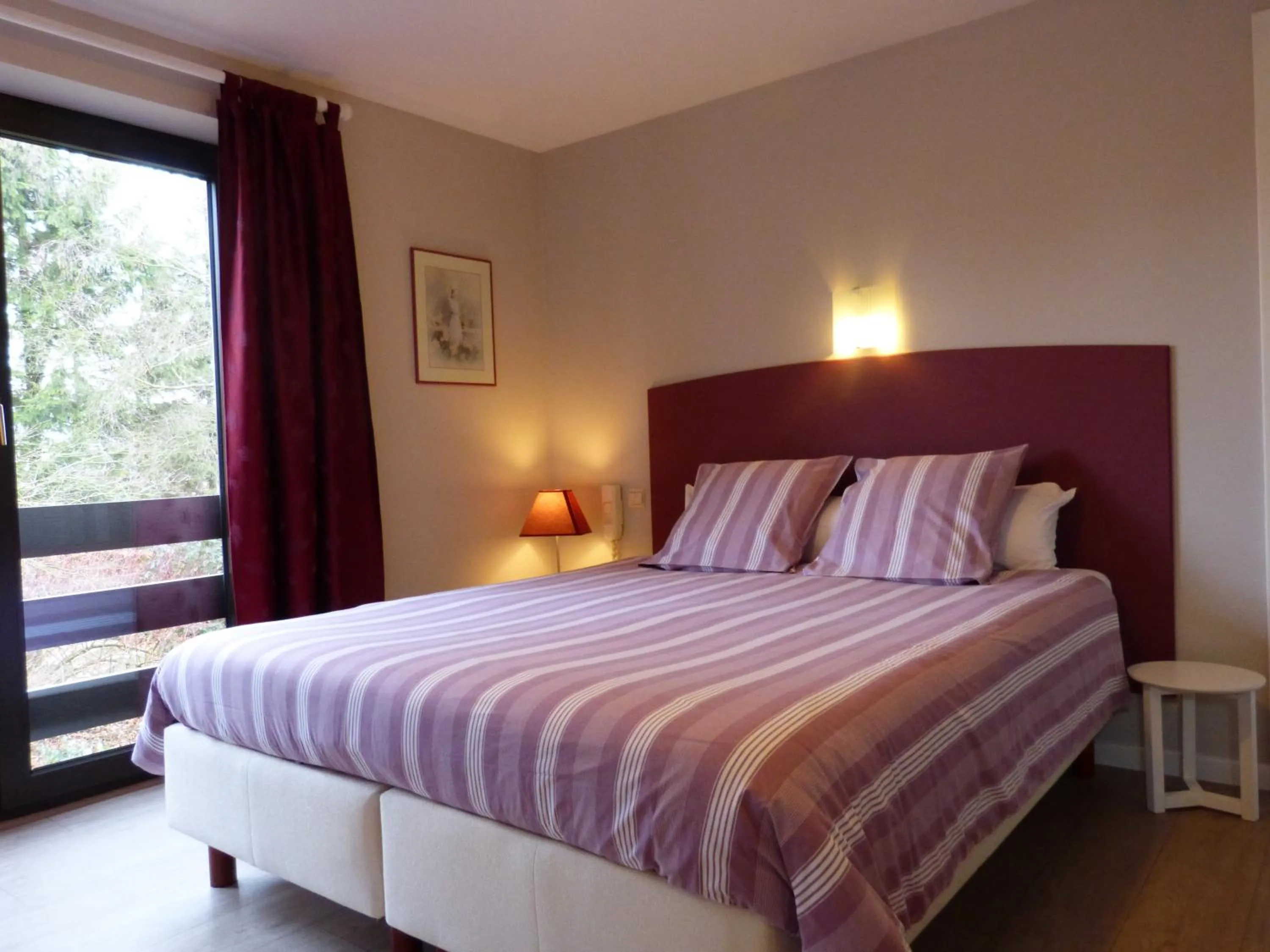 Bed in L'Horizon Studios & Apparts