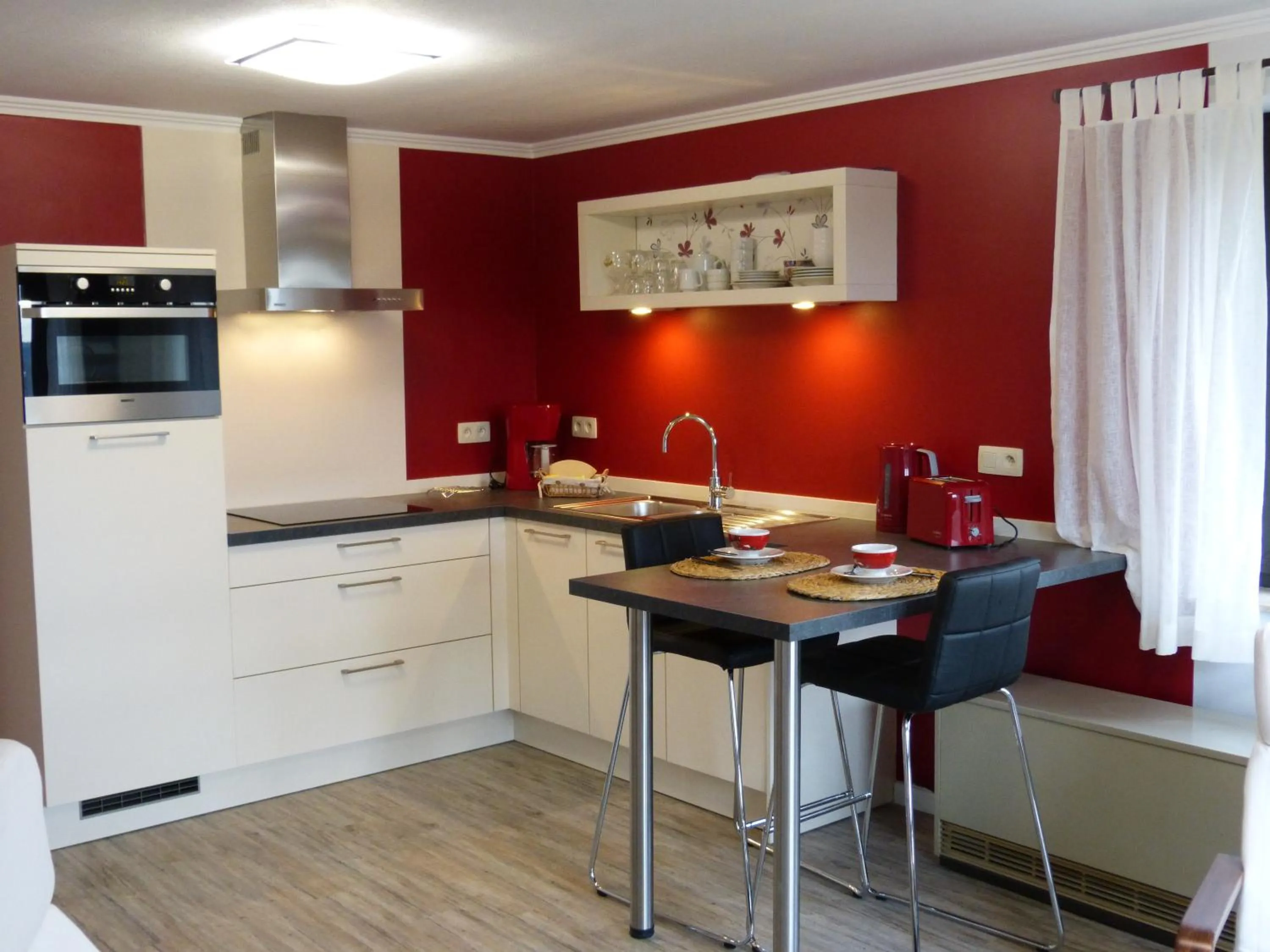Kitchen or kitchenette in L'Horizon Studios & Apparts