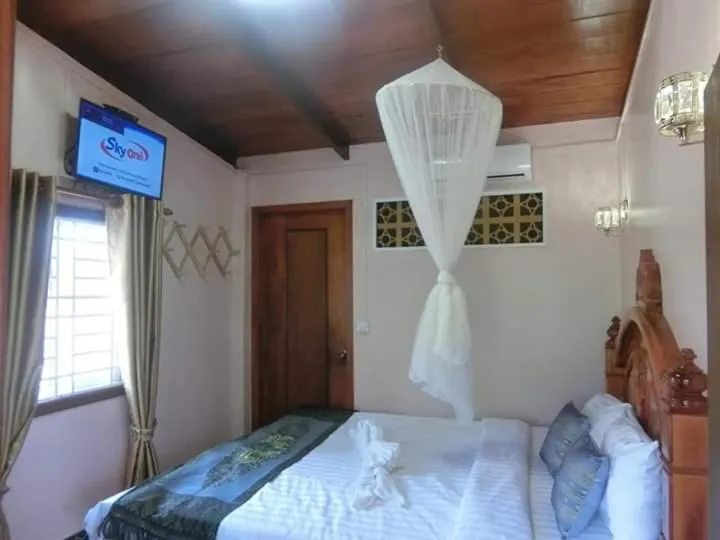 Bed in Greenhouse Retreat