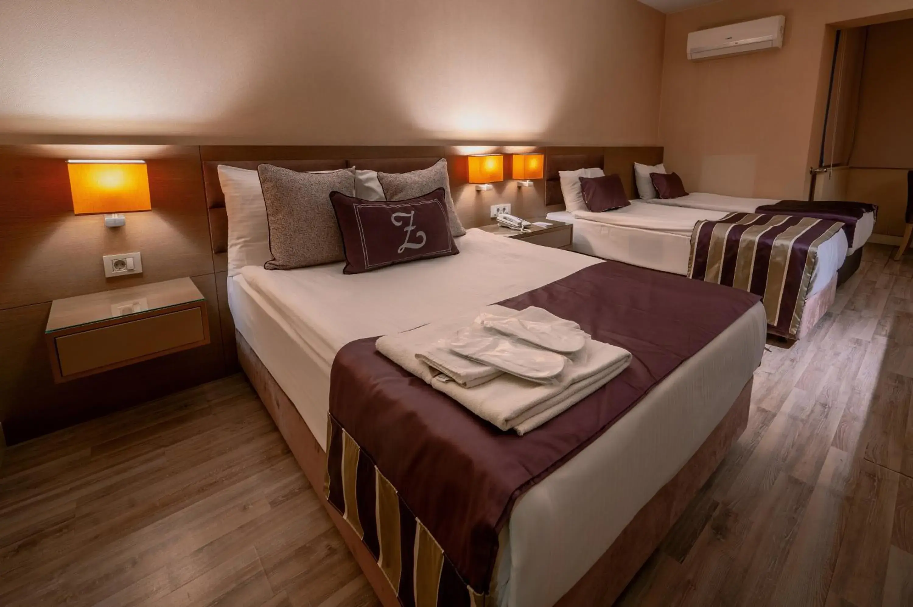 Bed in The New Hotel Zeybek