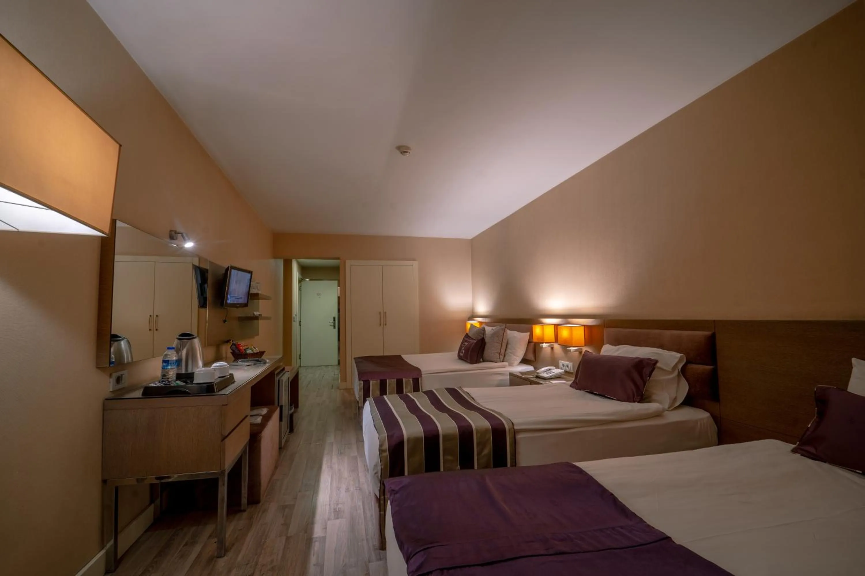 Bed in The New Hotel Zeybek