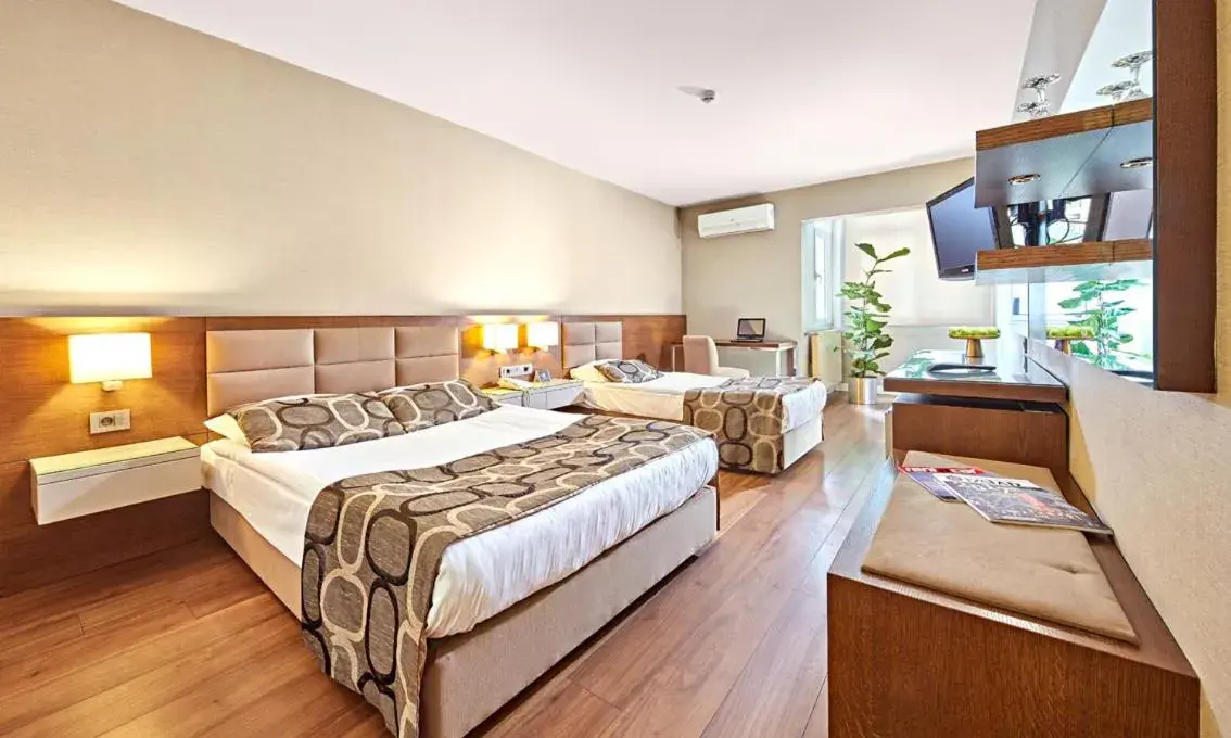 Bedroom in The New Hotel Zeybek