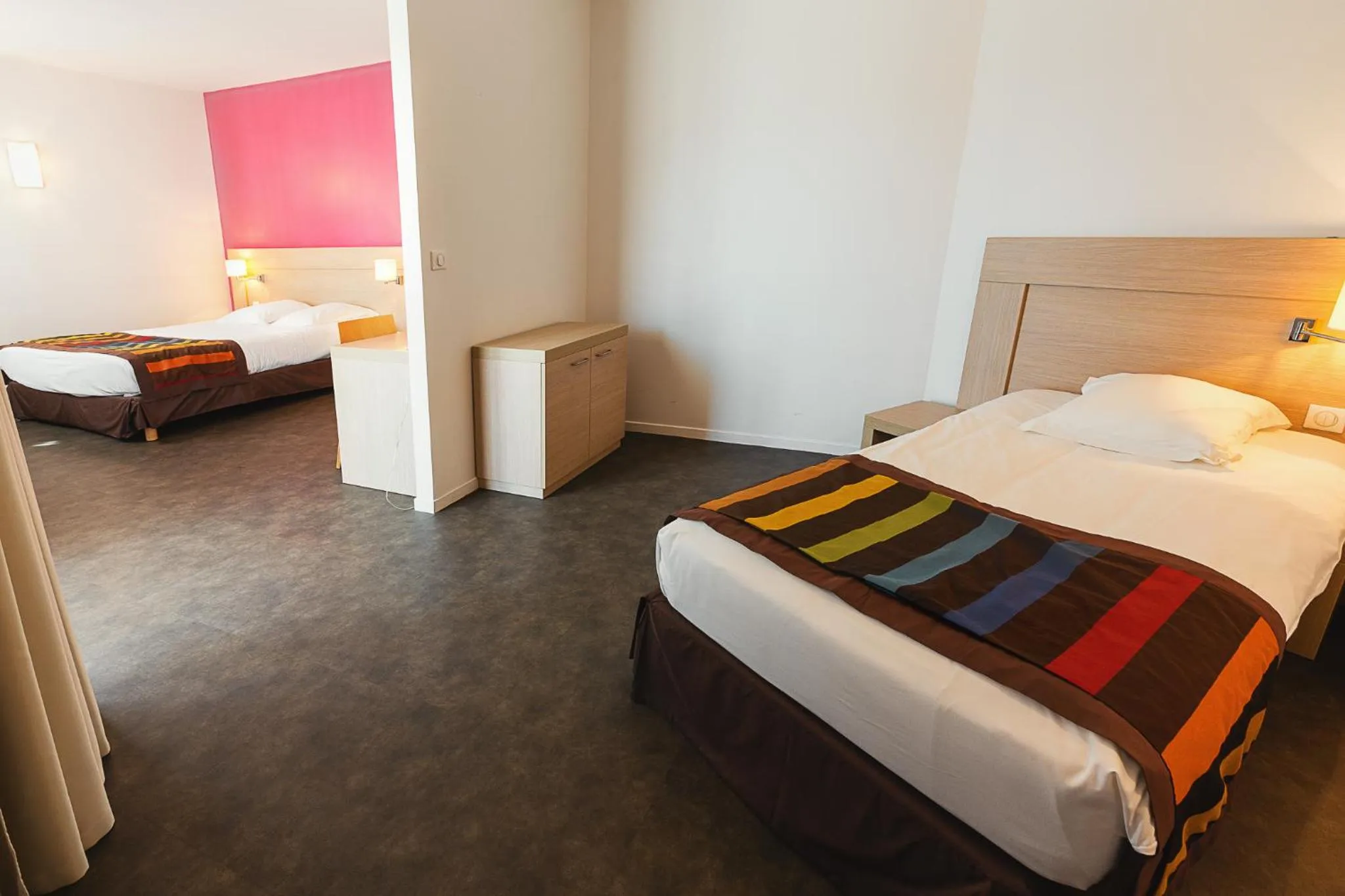 Bed in Esatitude Hotel