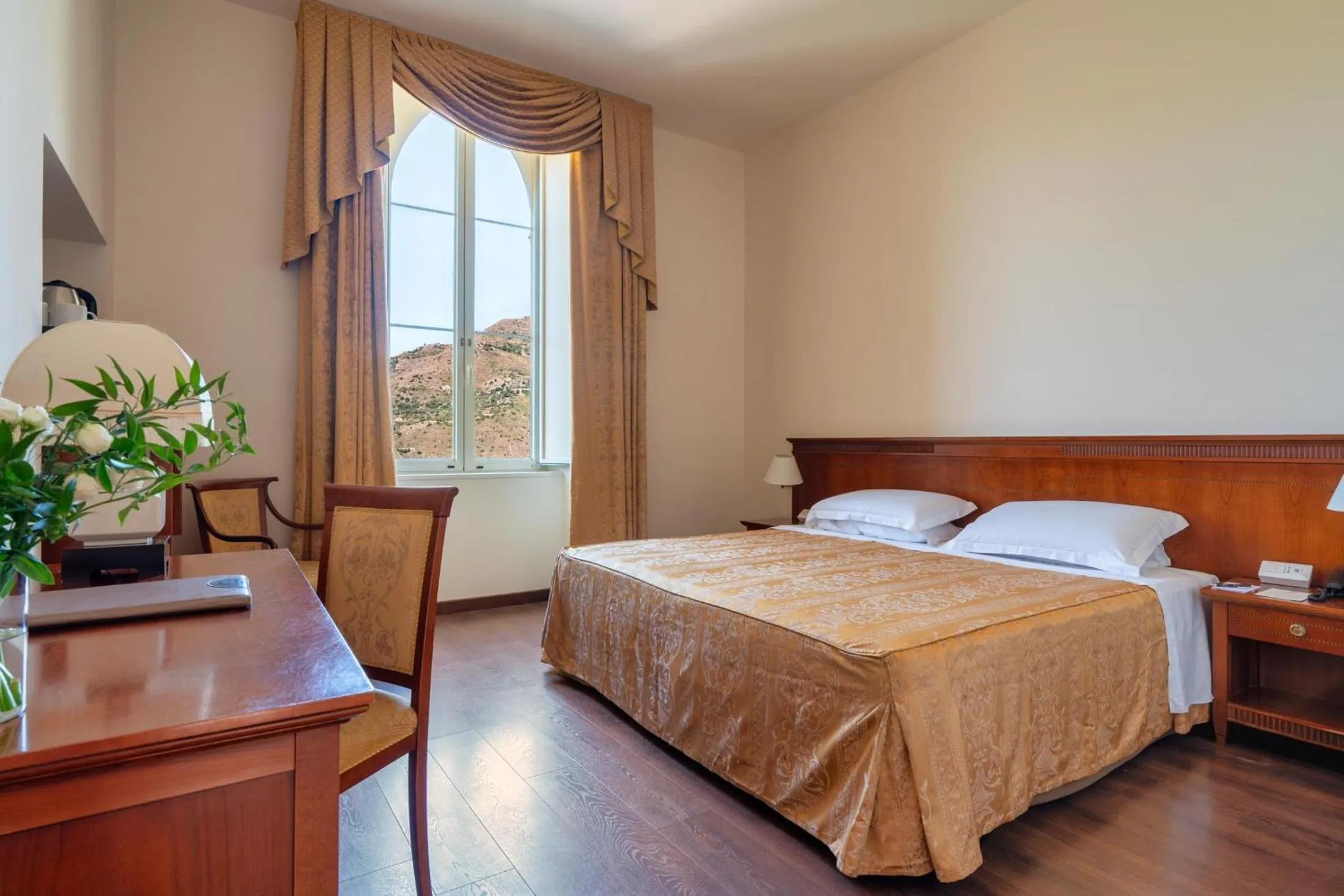 Bed in Excelsior Palace Hotel