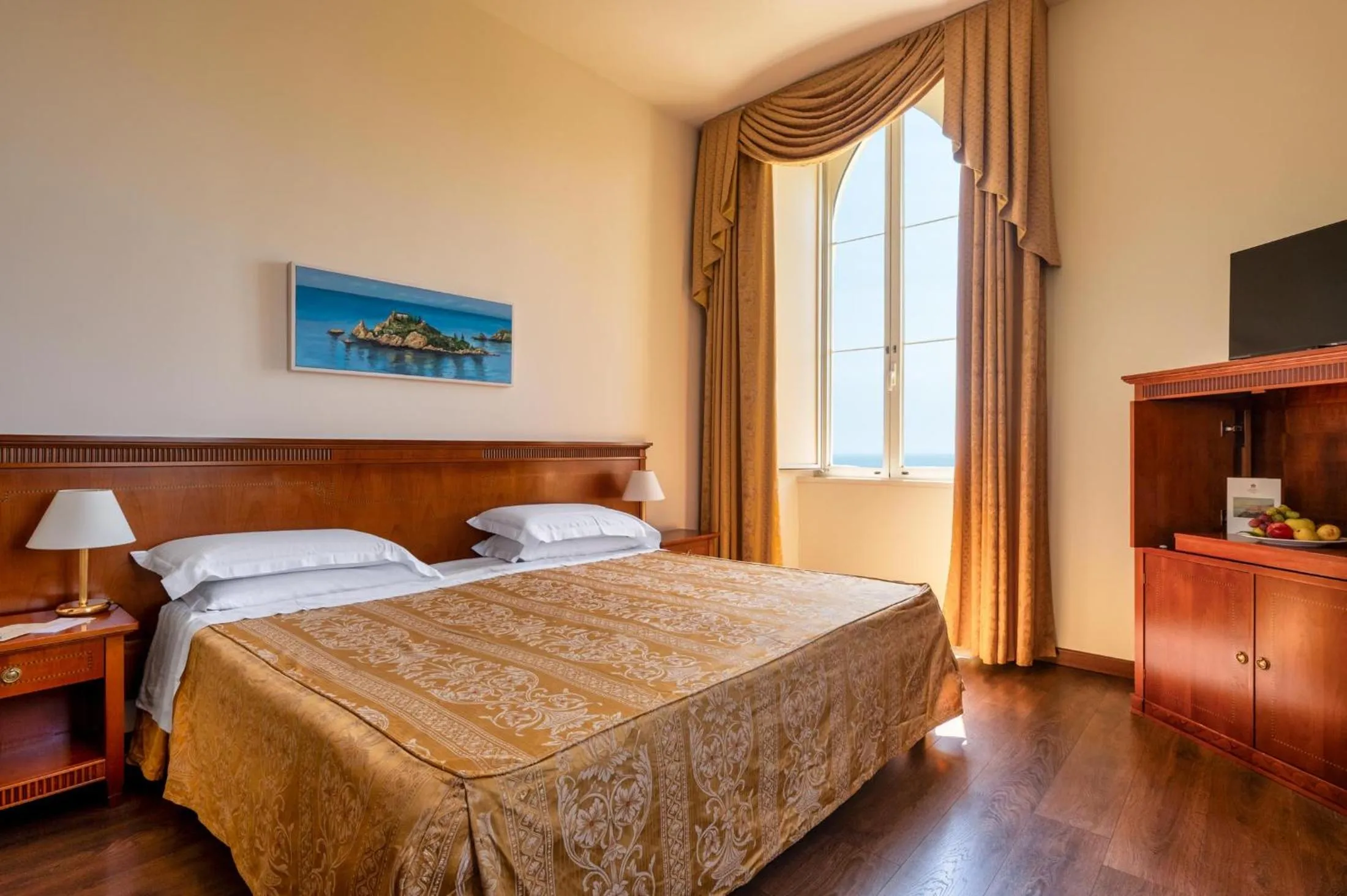 Bed in Excelsior Palace Hotel