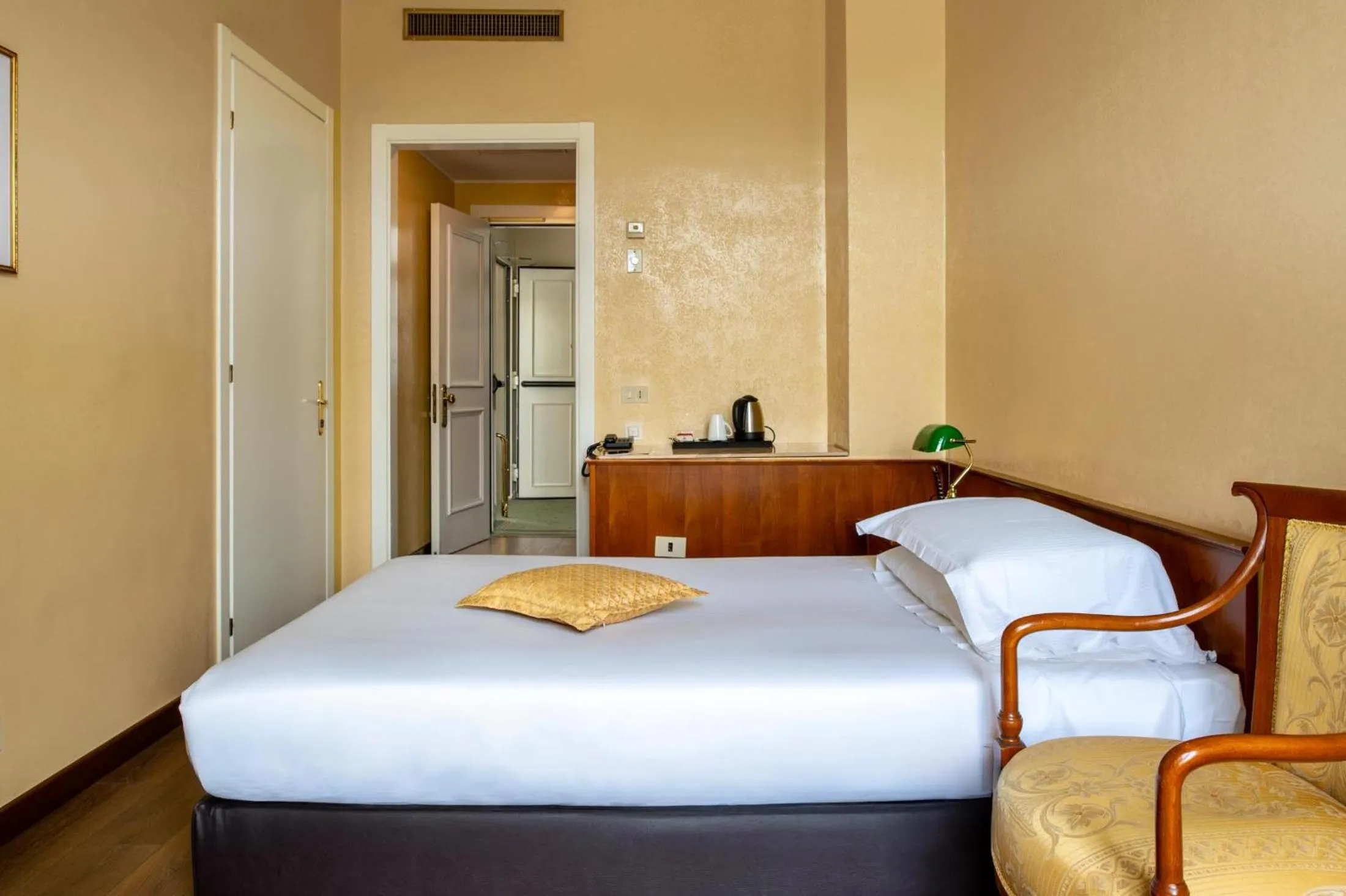 Bed in Excelsior Palace Hotel