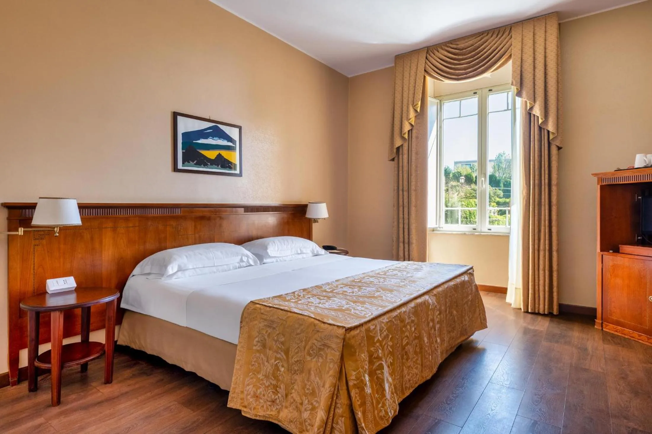 Bed in Excelsior Palace Hotel