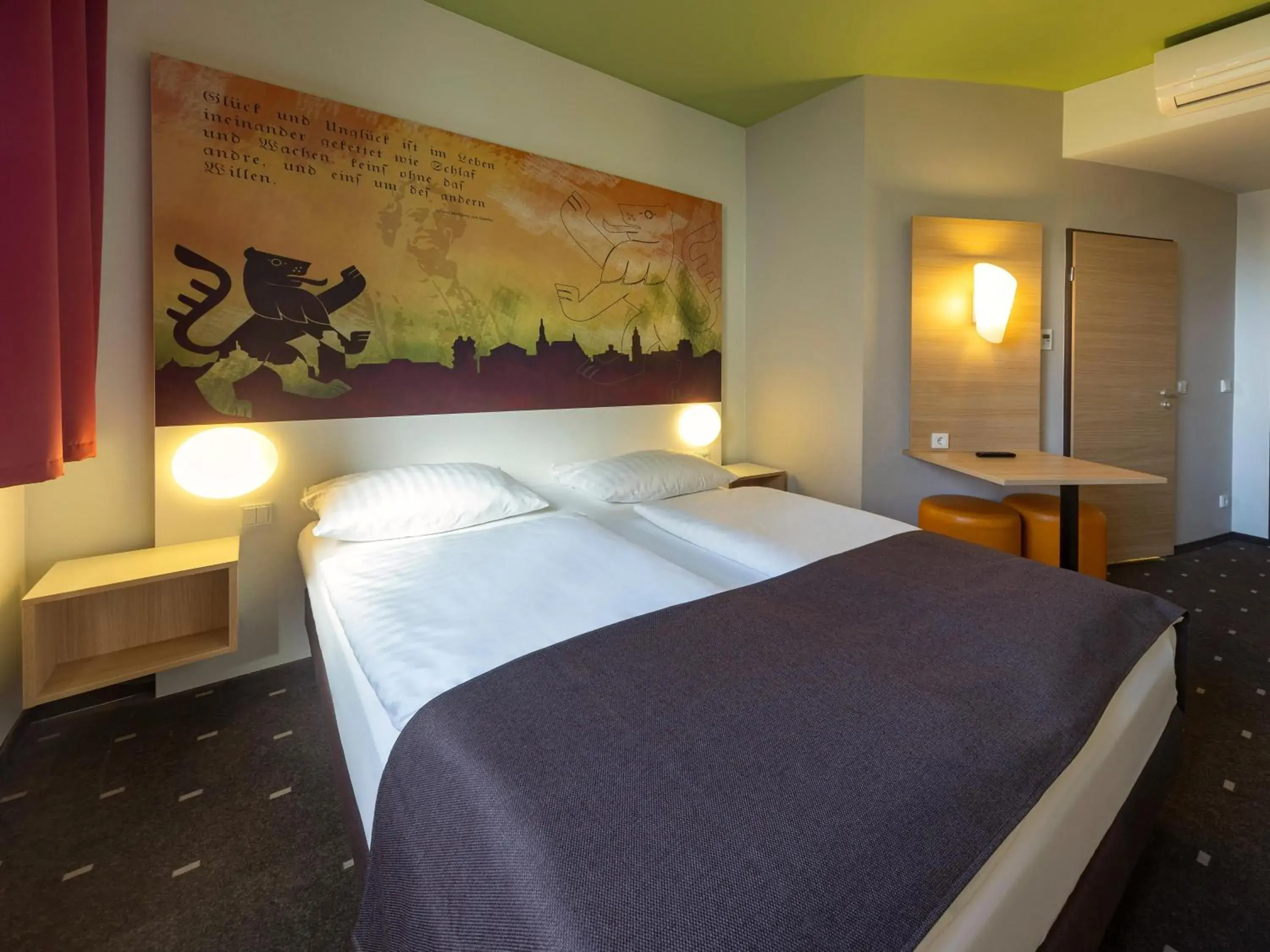 Bed in B&B Hotel Weimar Bed in B&B Hotel Weimar