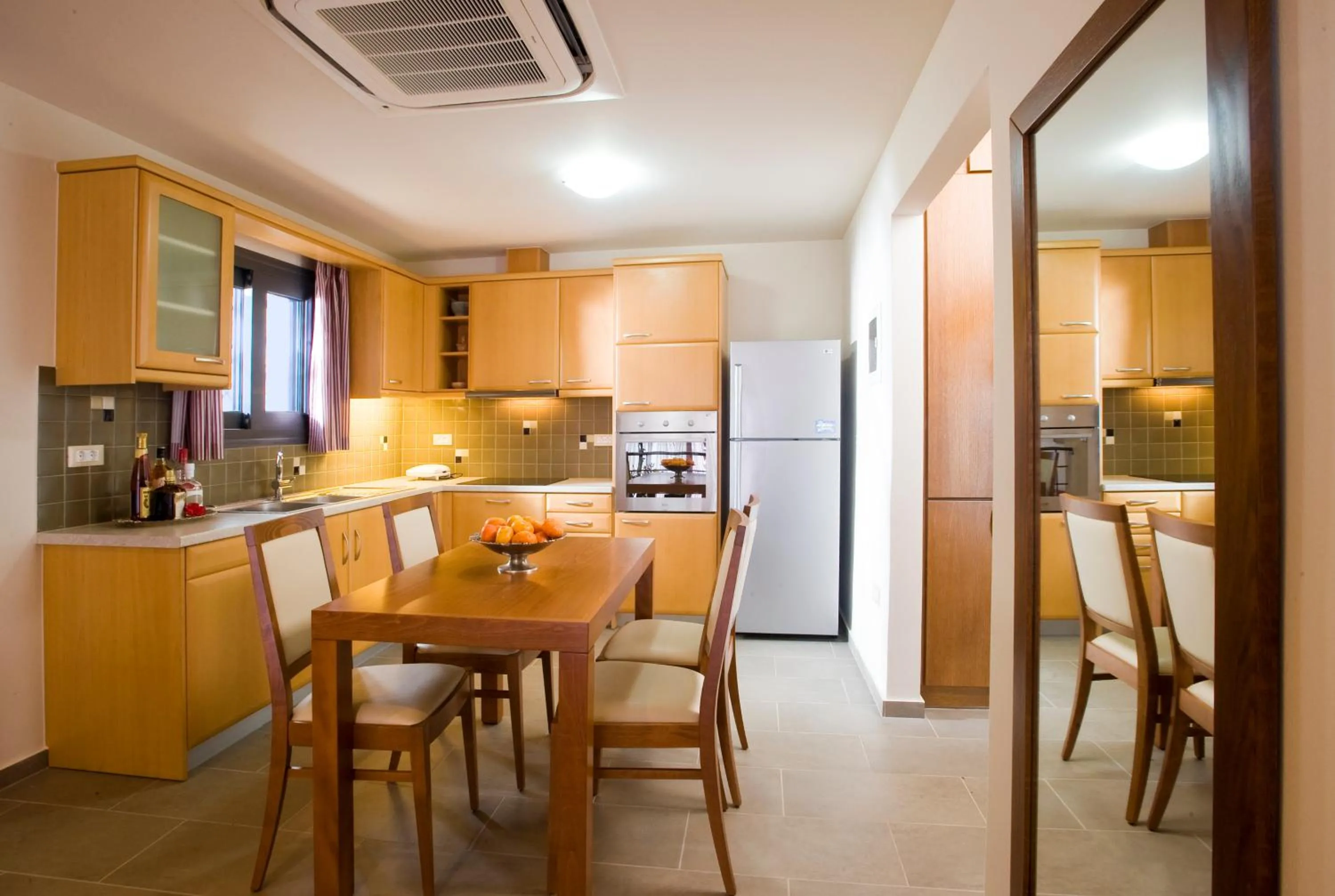 Kitchen or kitchenette in Elounda Olea Villas And Apartments