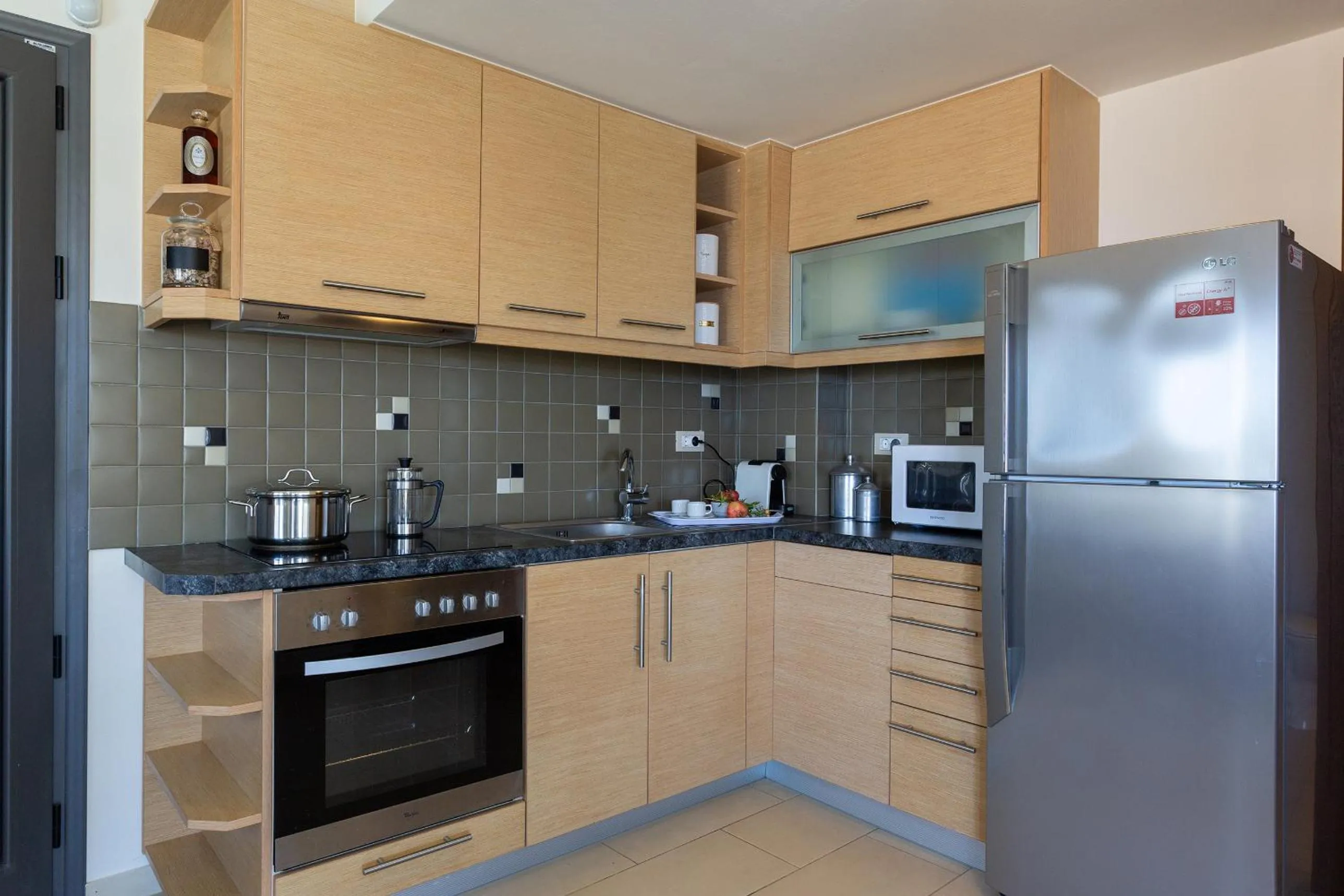 Kitchen or kitchenette in Elounda Olea Villas And Apartments
